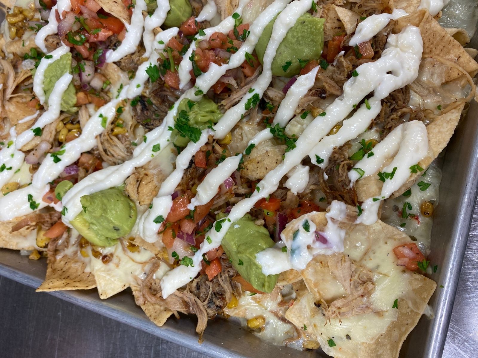 Order Adobo Braised Pork Nachos food online from Skybokx 109 Sports Bar And Grill store, Natick on bringmethat.com