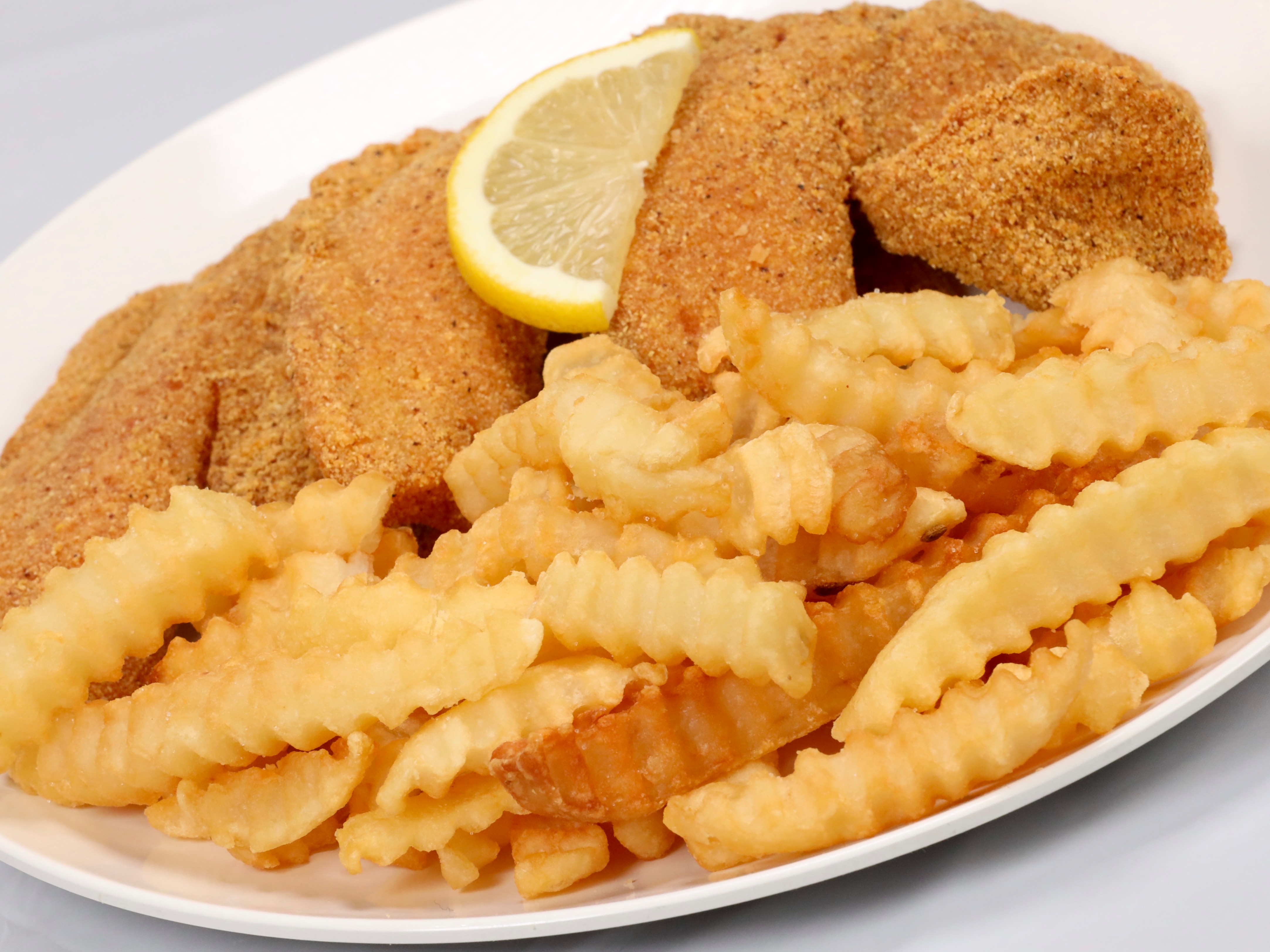 Order Tilapia Dinner food online from Sam Sylk Chicken And Fish store, Euclid on bringmethat.com
