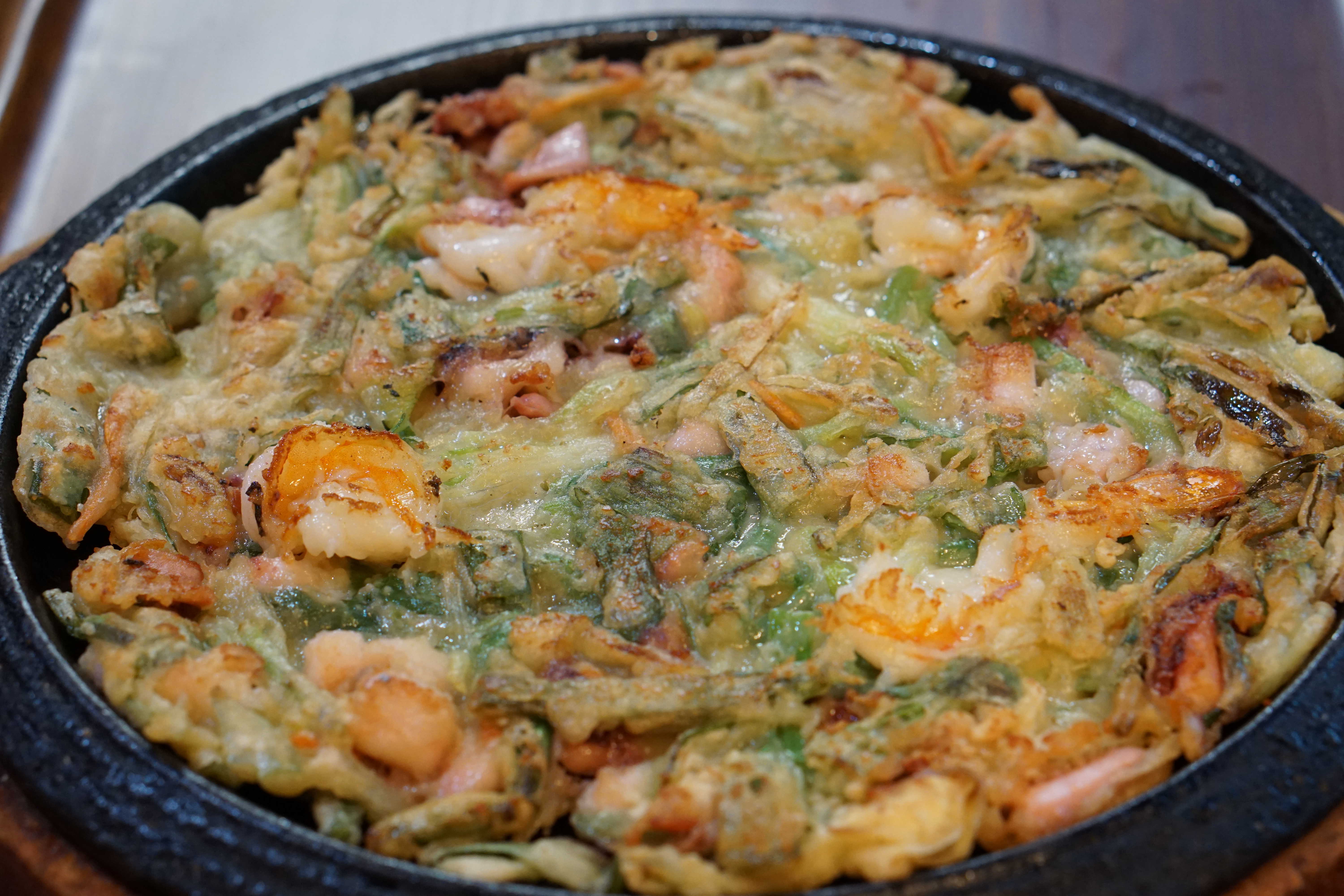 Order A7. Seafood Pancake food online from Mg Tofu House store, Los Angeles on bringmethat.com