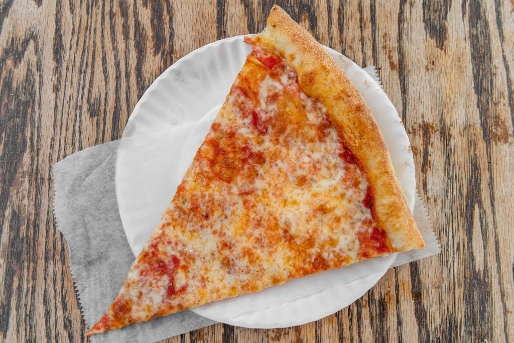 Order Cheese Pizza Slice - Slice food online from Rivoli Pizza II store, New York on bringmethat.com
