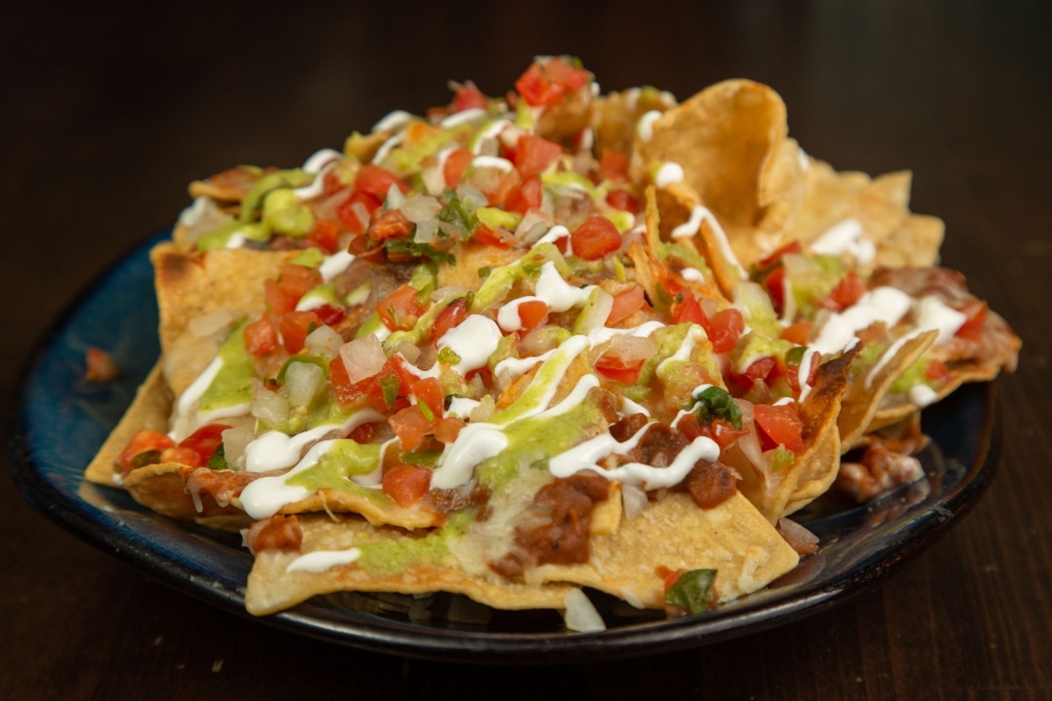 Order Nachos food online from Hussongs Cantina store, Las Vegas on bringmethat.com