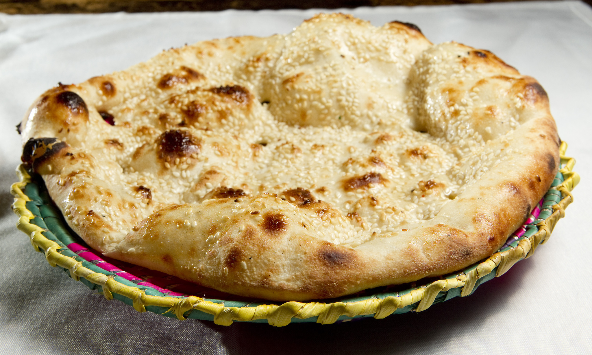 Order Sesame Naan food online from India's Grill store, Los Angeles on bringmethat.com