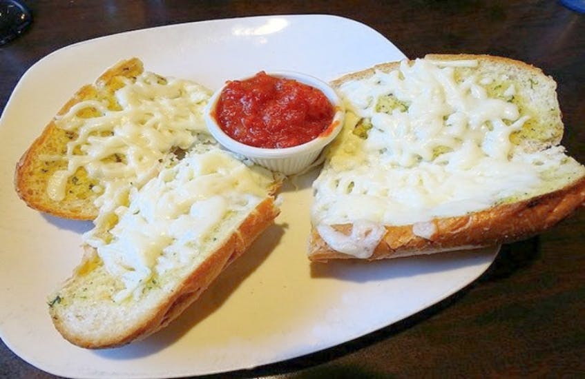 Order Loaf of Garlic Bread with Cheese - Appetizer food online from Ops Pizza Kitchin & Cafe store, Kingsland on bringmethat.com