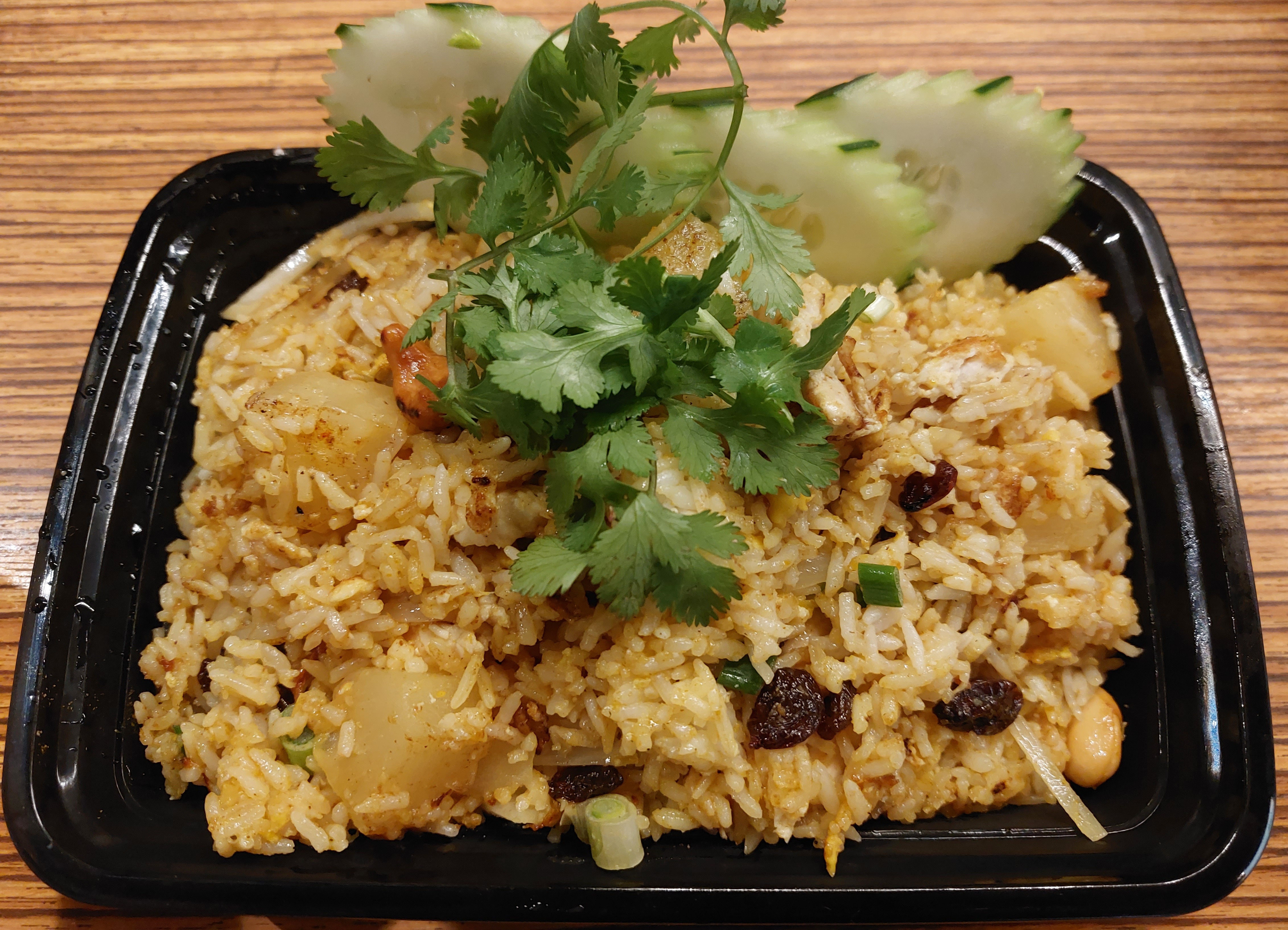 Order Pineapple Fried Rice food online from Issara Thai Cuisine store, Huntington Beach on bringmethat.com