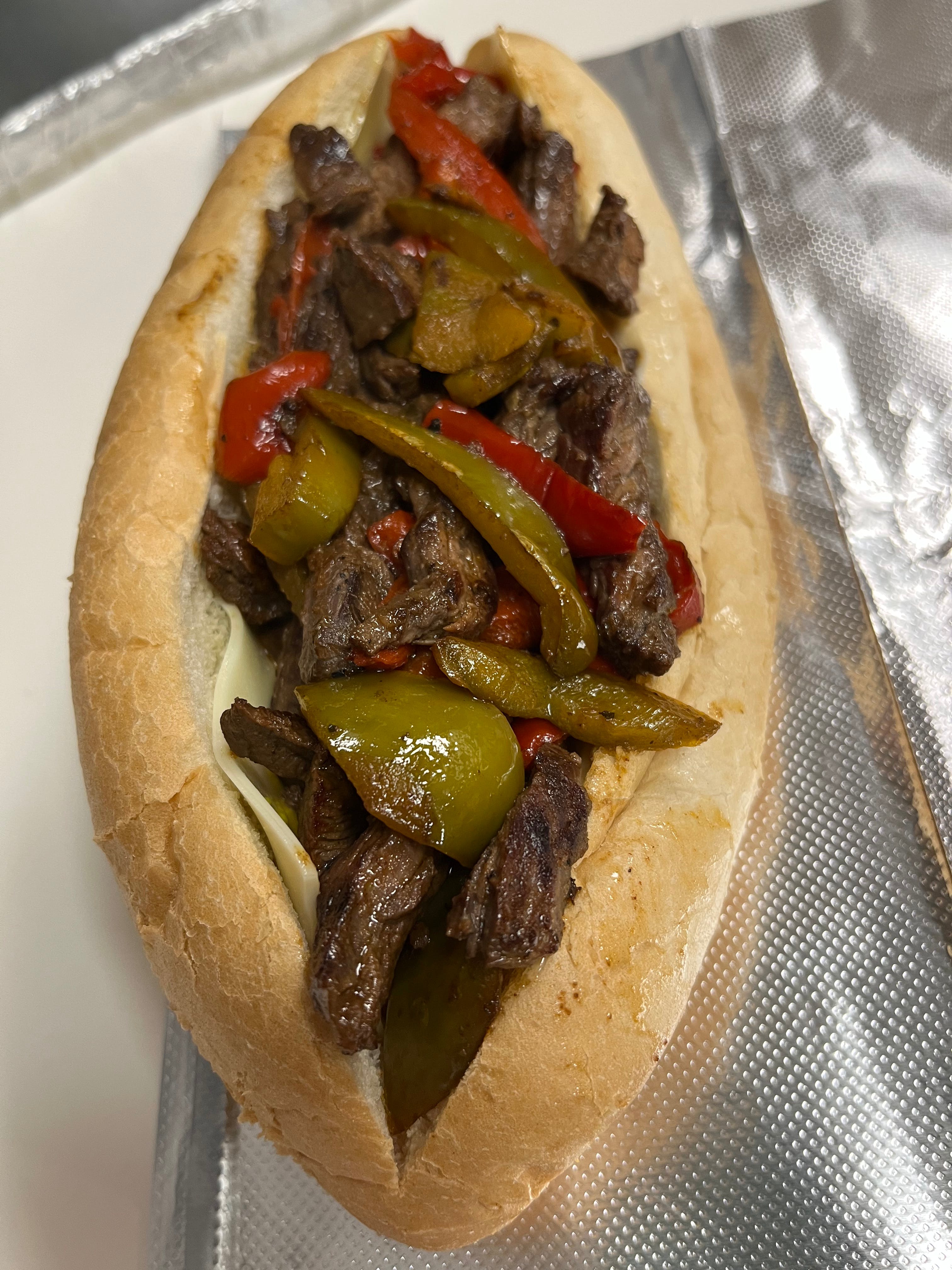 Order Steak Tip Sub - Small food online from Phillip's Roast Beef & Pizza store, Rowley on bringmethat.com