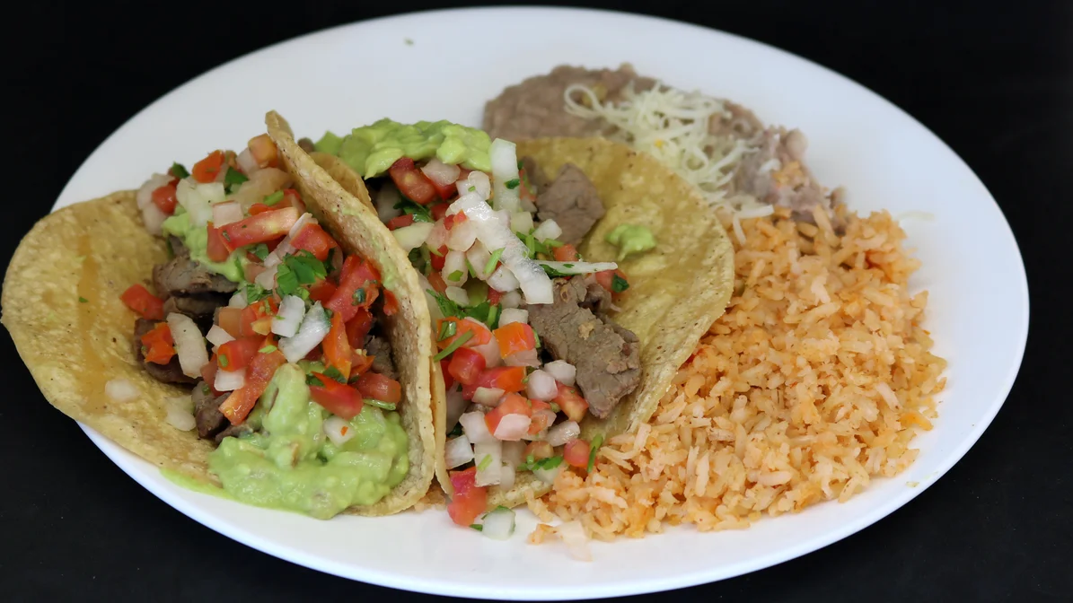 Order #8. Two Carne Asada Tacos Combination Plate food online from Albertaco store, San Bernardino on bringmethat.com