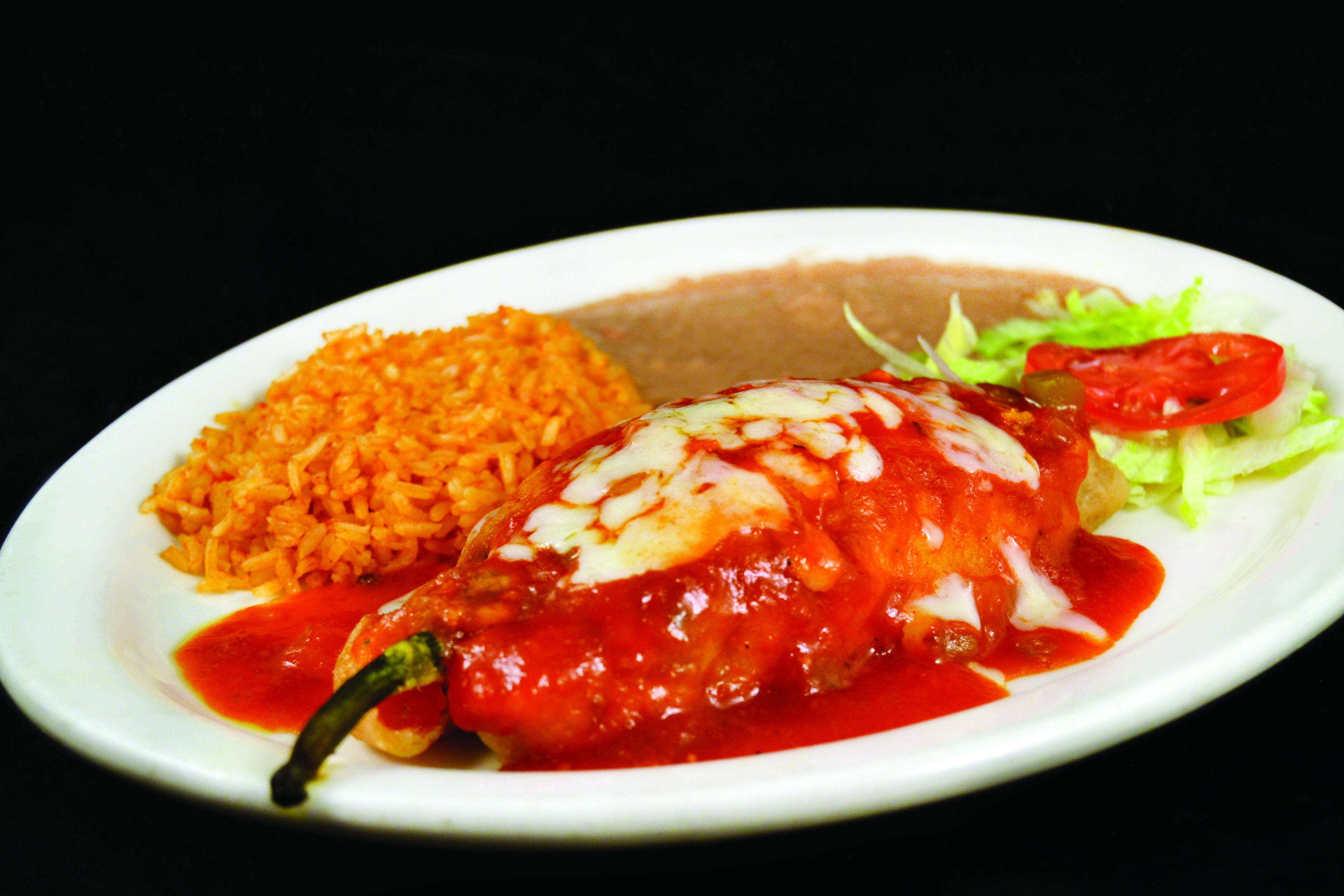 Order Chile Relleno Ground beef food online from Mi Comal Mexican Restaurant store, Irving on bringmethat.com