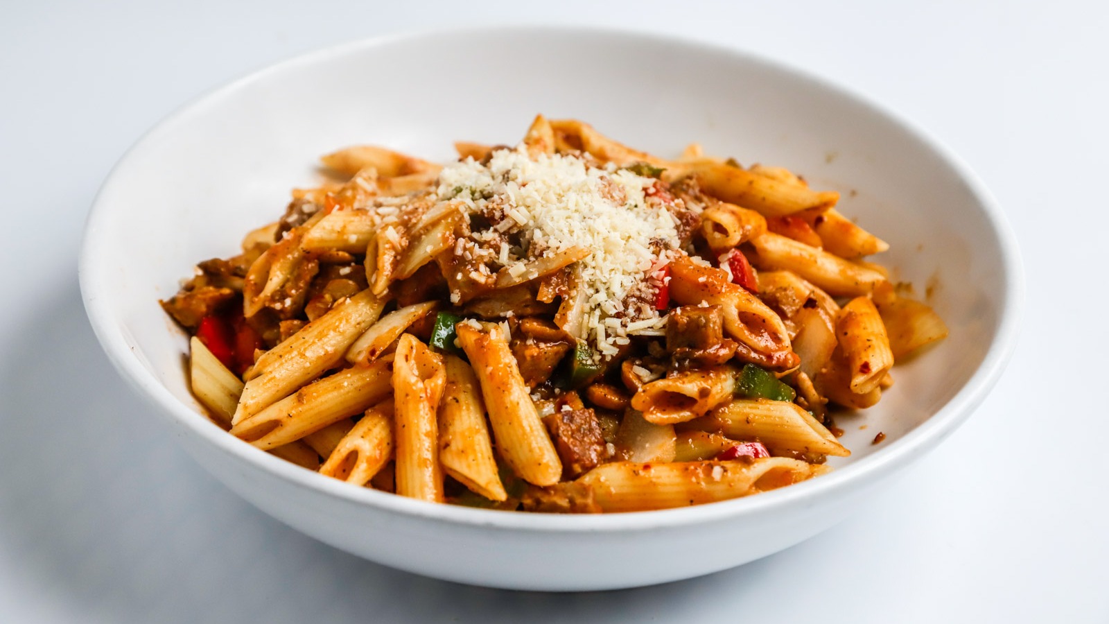 Order Sausage Penne food online from California Pasta Delivery store, Santa Barbara on bringmethat.com