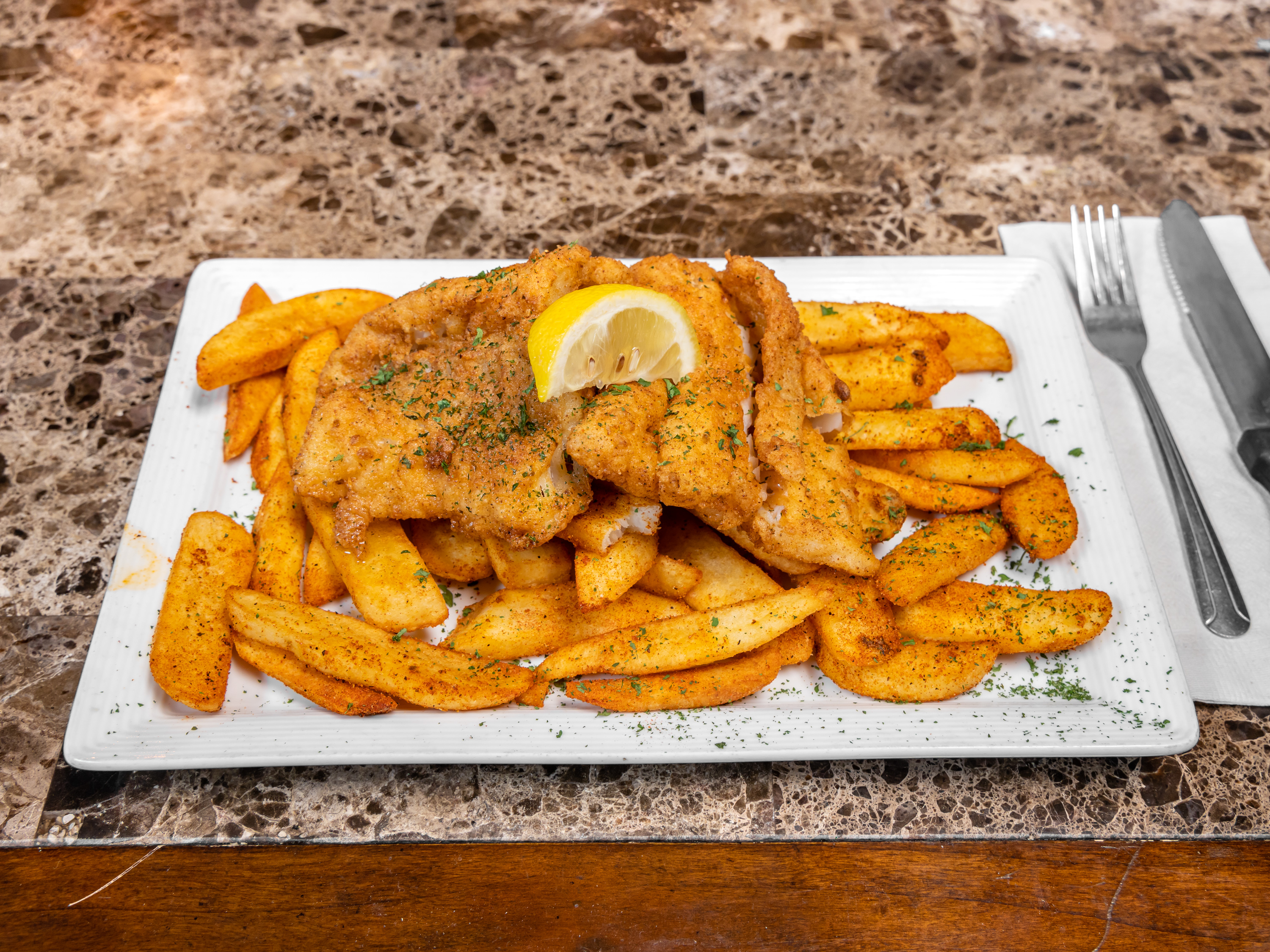 Order Fish and Chips food online from Celebrities Sports Grill store, San Bernardino on bringmethat.com