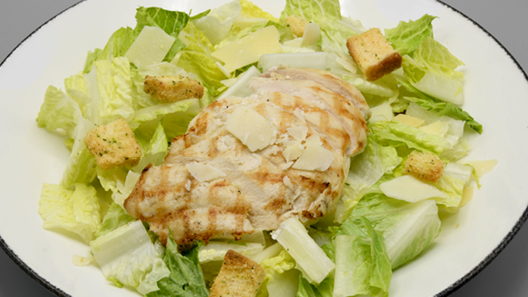 Order Caesar Salad with Grilled Chicken food online from Mitchell's Fish Market store, Lansing on bringmethat.com