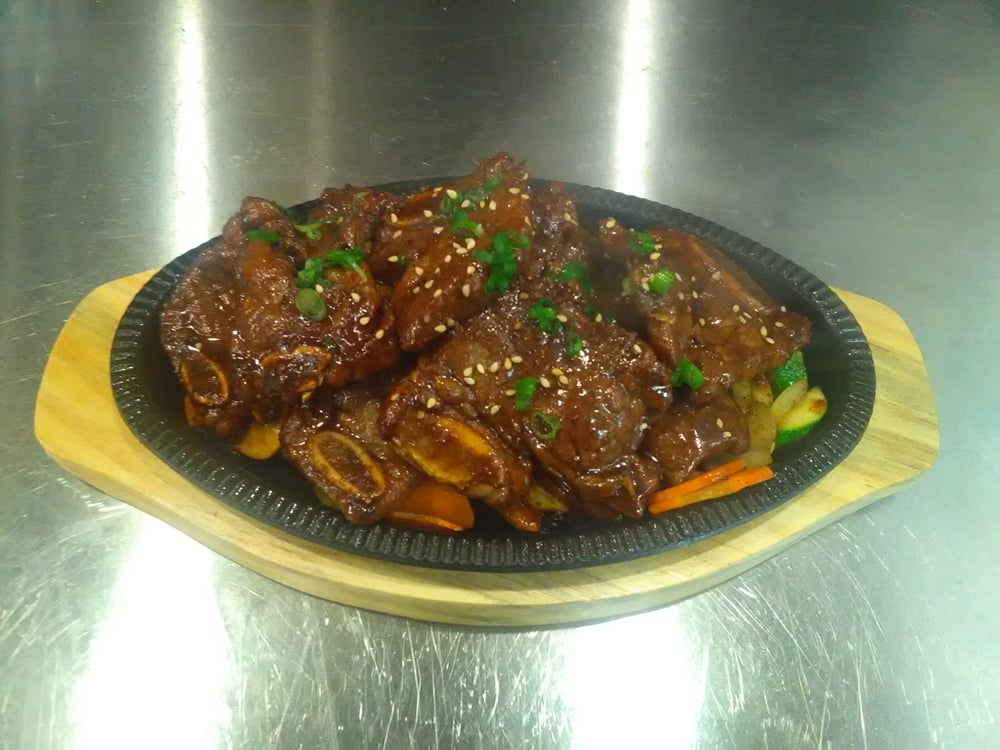 Order BBQ Short Ribs food online from Carolina sushi and roll store, Raleigh on bringmethat.com
