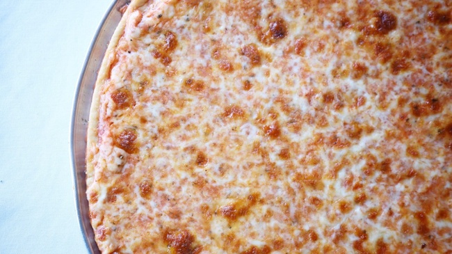 Order Thin Crust Cheese Pizza (Individual 10" (Serves 1)) food online from Lucca's Pizzeria & Ristorante store, La Grange on bringmethat.com