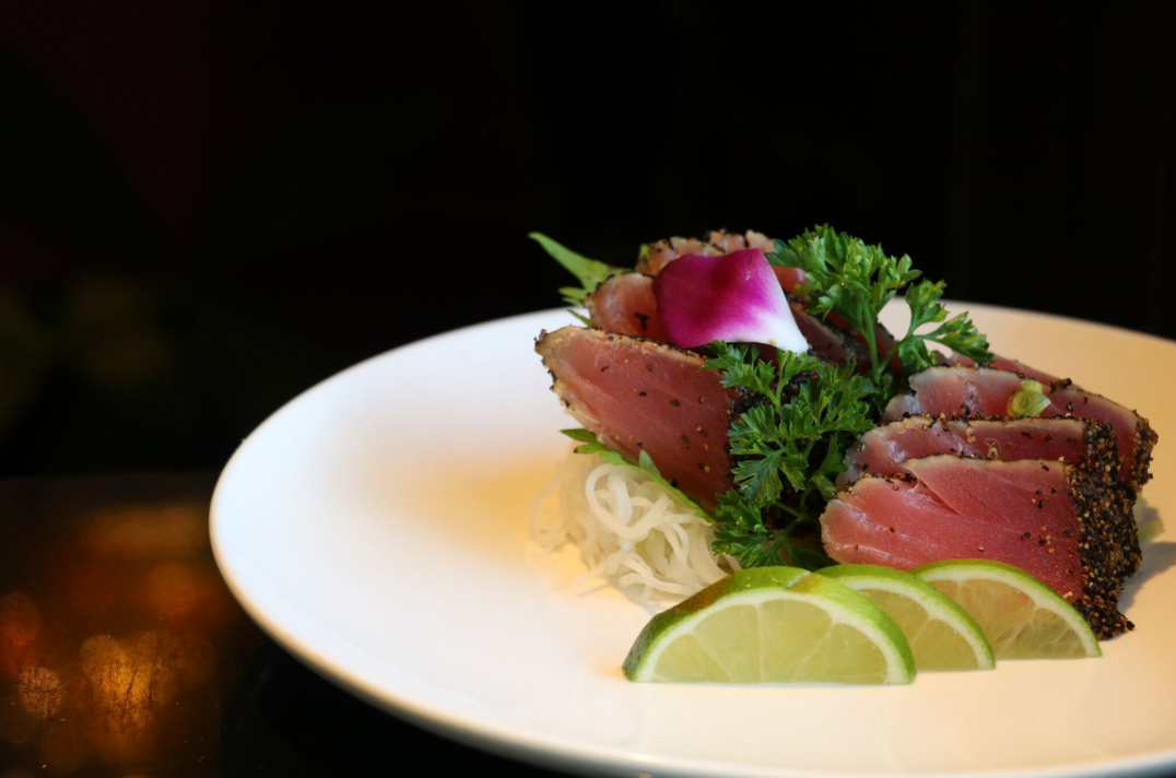 Order 8 Pieces Black Pepper Tuna Sashimi food online from Sushi Sakura Express store, Houston on bringmethat.com