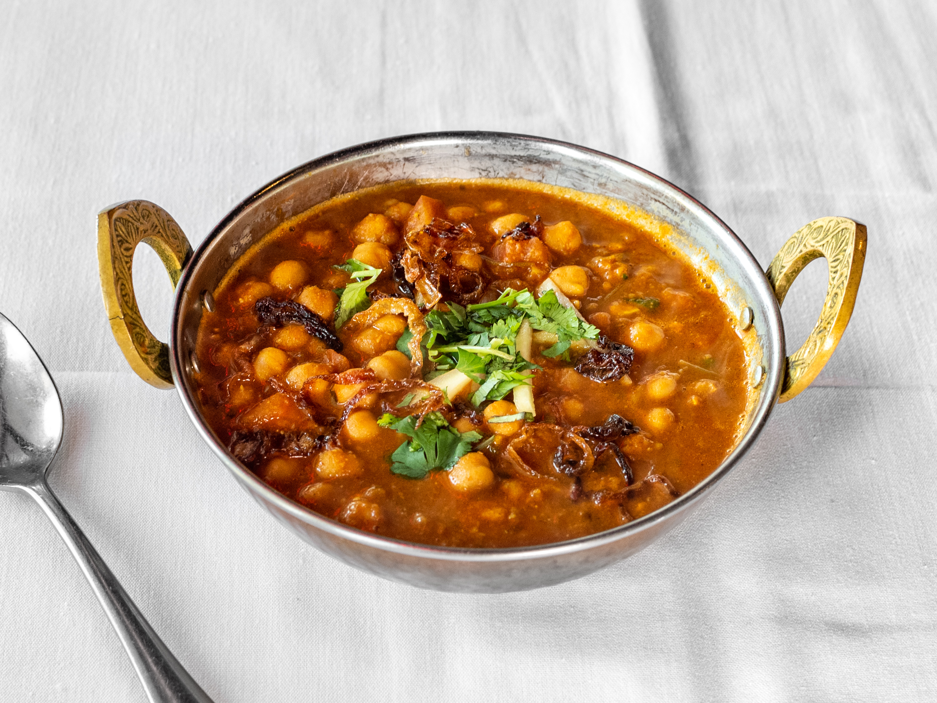 Order Chana Masala  food online from Tamarind Indian Cuisine store, Sterling on bringmethat.com