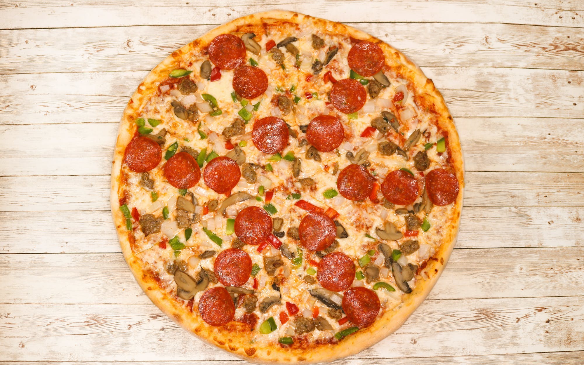Order Deluxe Pizza - Personal 10'' food online from Villa Pizza store, South Plainfield on bringmethat.com
