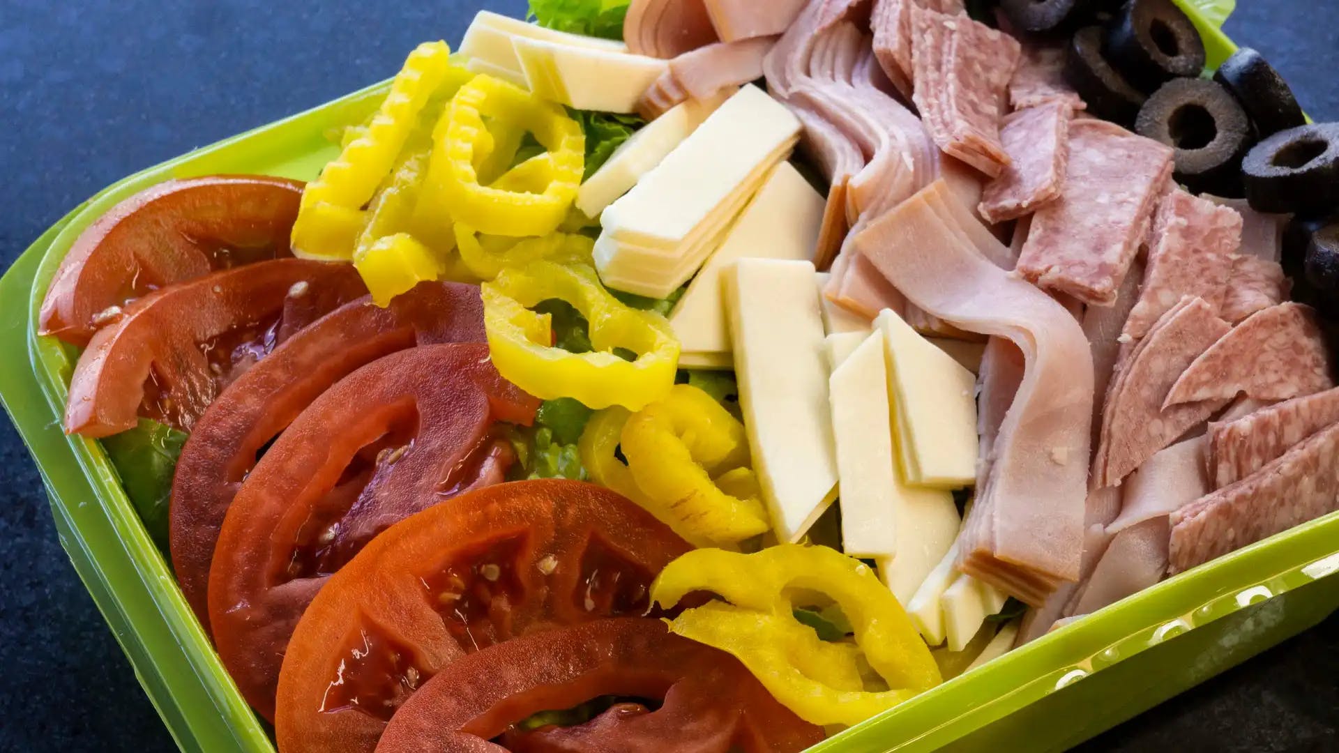 Order Antipasto Salad - Salad food online from Tubby's Grilled Submarines store, Westland on bringmethat.com