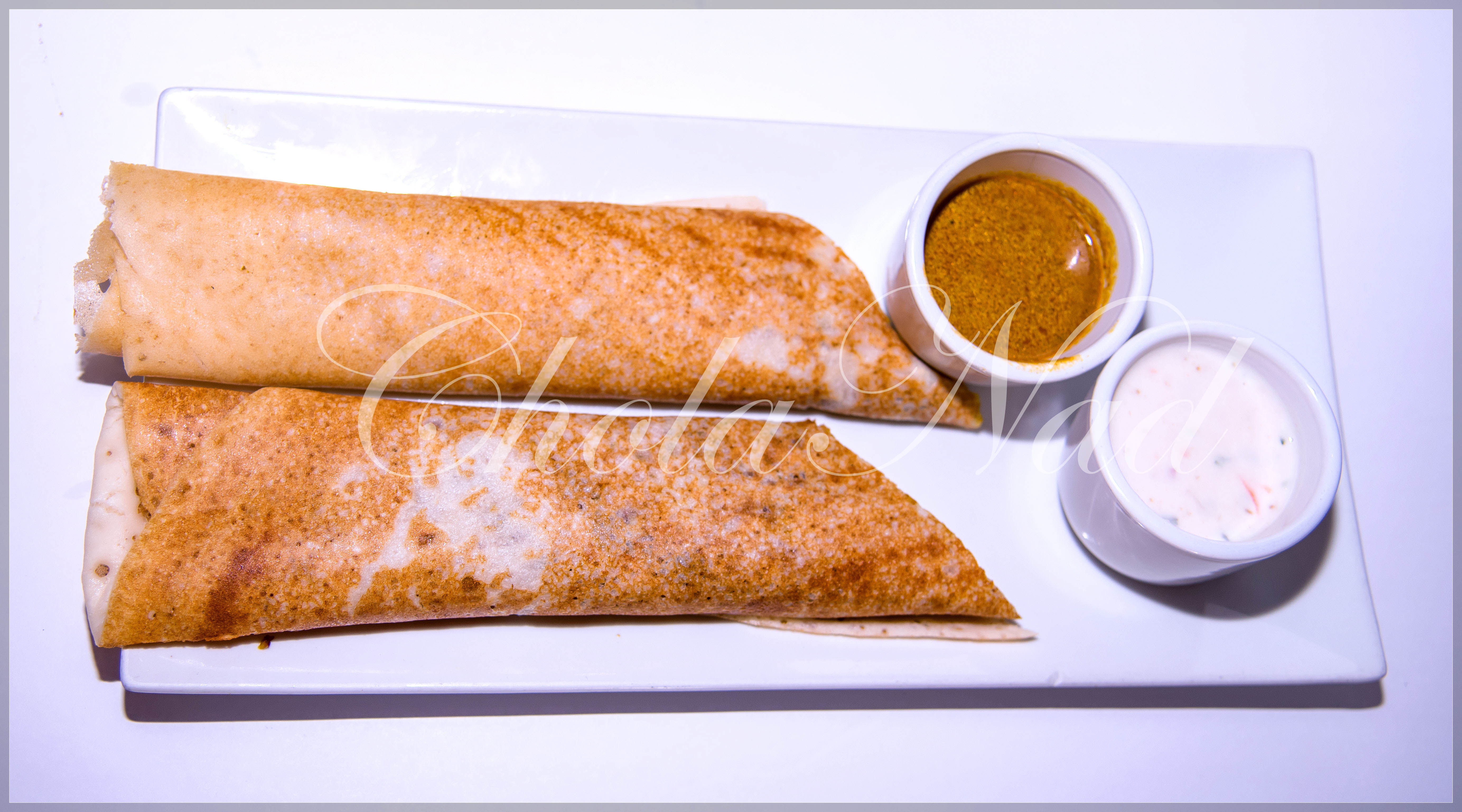 Order Sauteed Chicken Dosa food online from Cholanad store, Chapel Hill on bringmethat.com