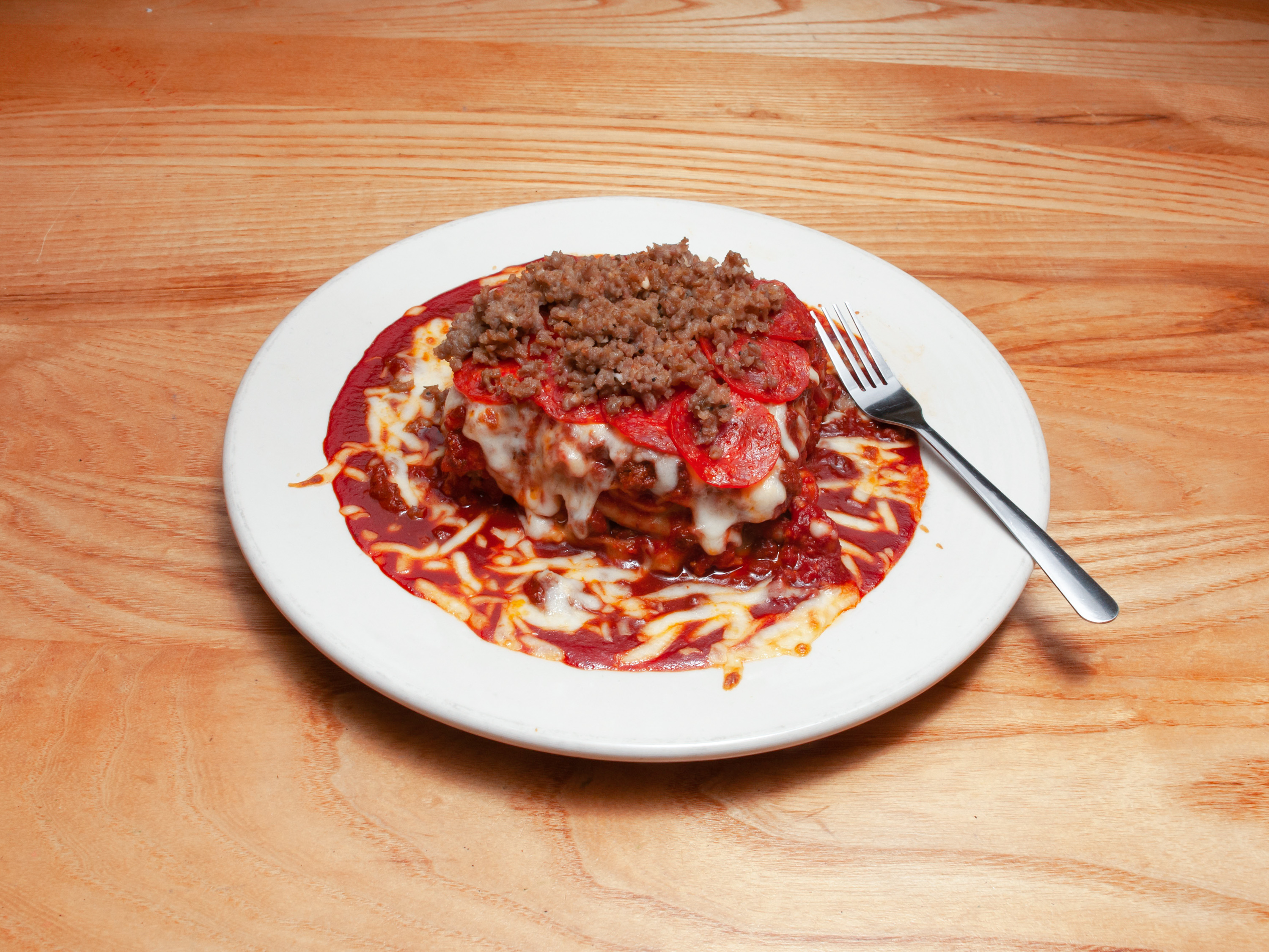 Order Meat Lover's Lasagna food online from Ragazzi's Italian Restaurant store, Garner on bringmethat.com
