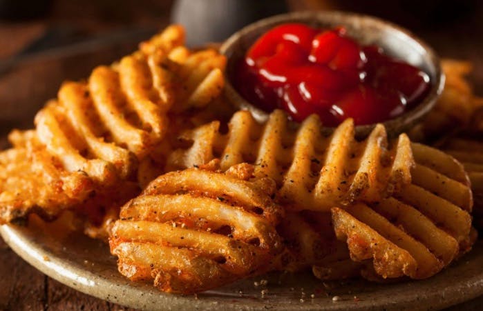 Order Waffle Fries - Appetizer food online from Greek's Pizzeria store, Portland on bringmethat.com