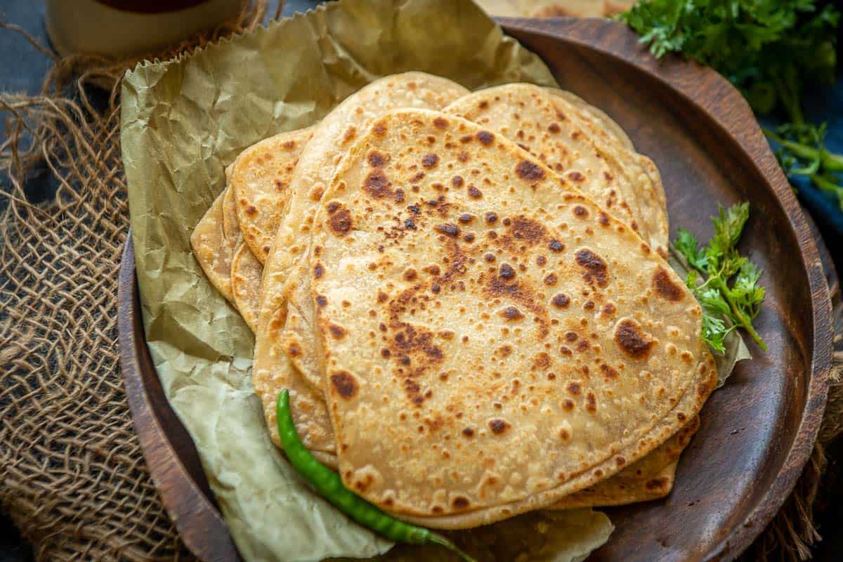 Order Tava Paratha food online from Baisakhi Dhaba store, Voorhees Township on bringmethat.com