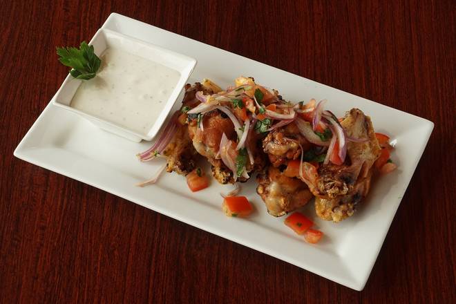 Order Andes Chicken Wings (8) food online from Los Andes Latin Bistro store, Minneapolis on bringmethat.com