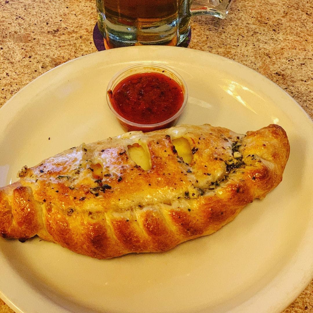 Order Stromboli Roll - Roll food online from Bella's Pizzeria store, Collierville on bringmethat.com