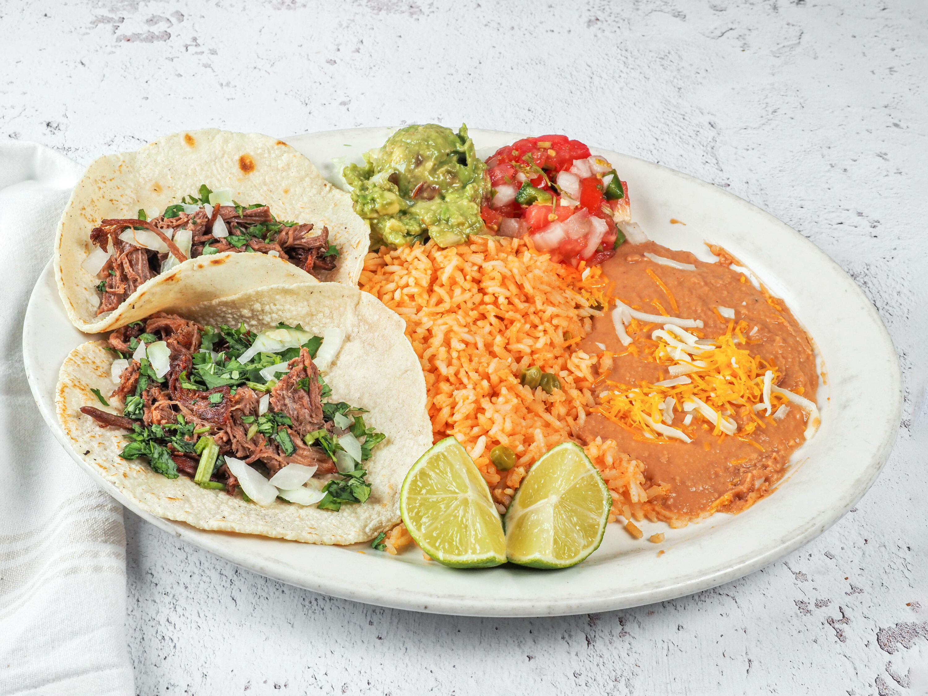 Order Tacos de Barbacoa food online from Zapata Mexican Grill store, Oklahoma City on bringmethat.com
