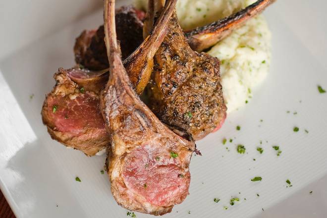 Order ROASTED RACK OF LAMB food online from Sullivan's Steakhouse store, Wilmington on bringmethat.com