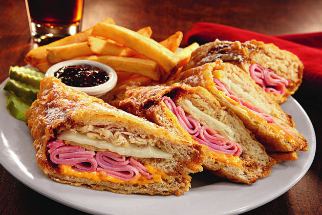 Order World Famous Monte Cristo Sandwich food online from Bennigan On The Fly store, Coralville on bringmethat.com