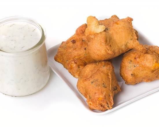 Order Corn and Jalapeño Hush Puppies  food online from Tomfoolery Sandwiches & Wraps store, Aurora on bringmethat.com