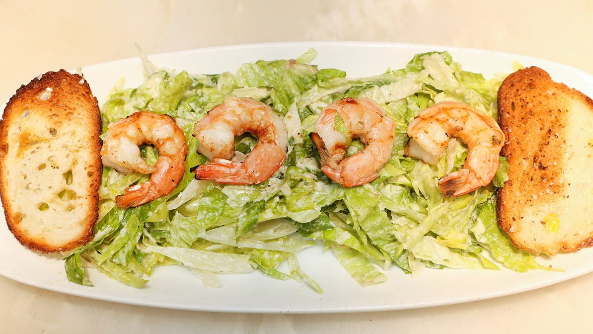 Order Shrimp Ceaser  Salad food online from Blue Seafood Bar store, New York on bringmethat.com
