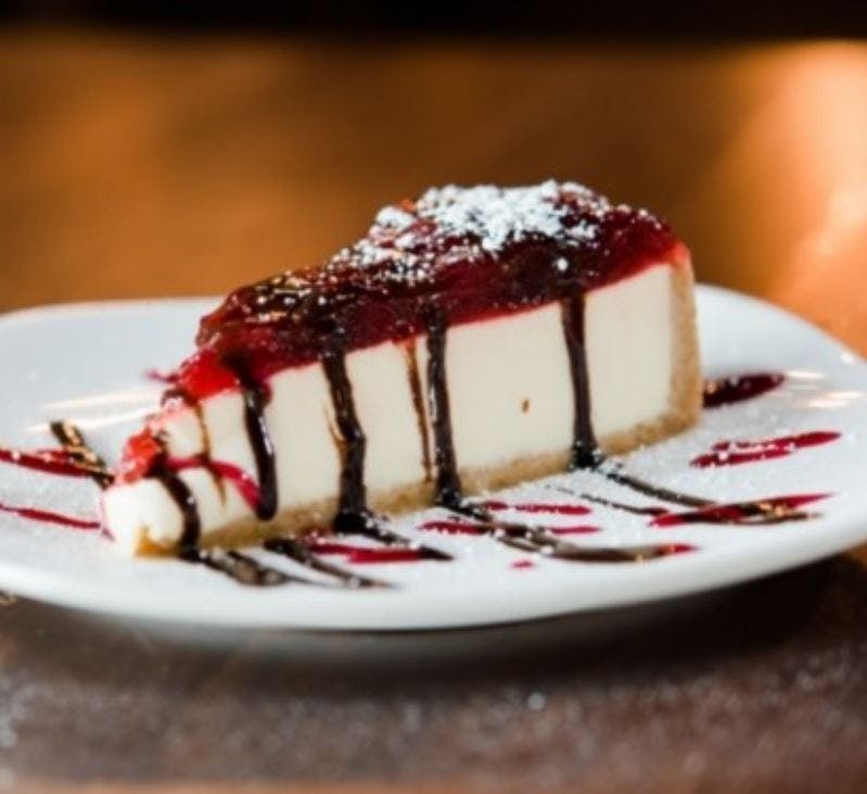 Order Strawberry Cheesecake - Dessert food online from Jonny Pizza store, Fort Worth on bringmethat.com