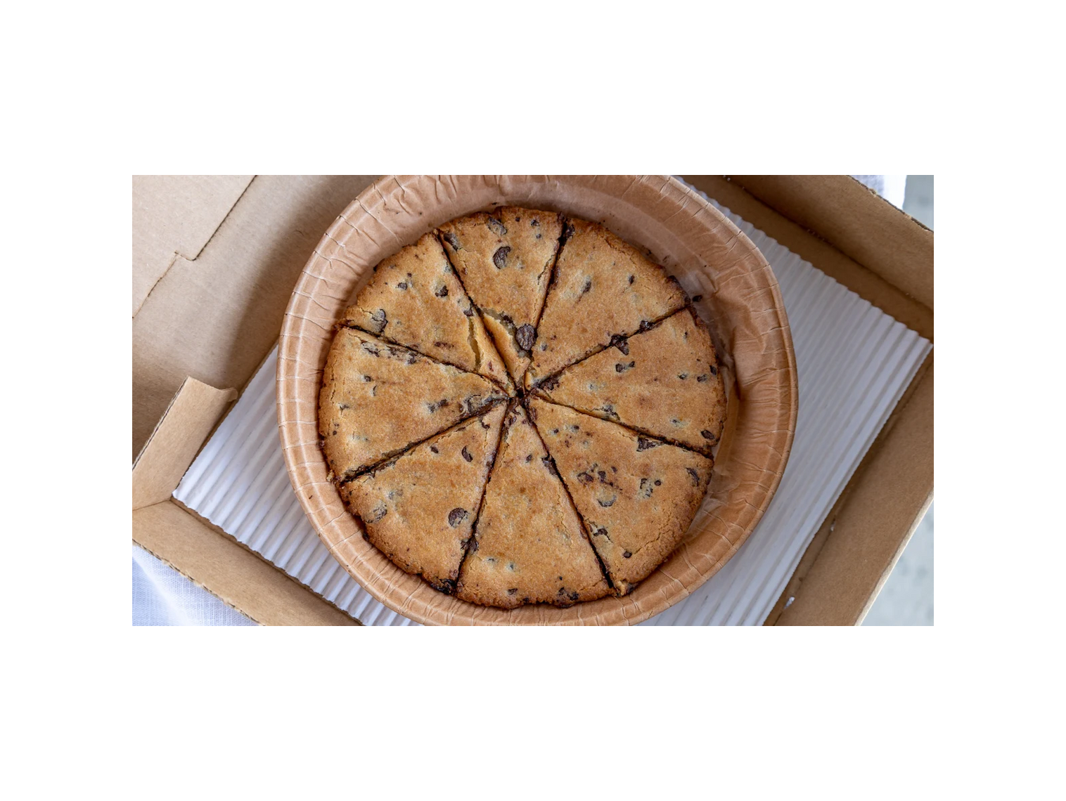 Order 8" Freshly Baked Chocolate Chip Cookie food online from Cousin Vinny's Pizza store, Muncie on bringmethat.com