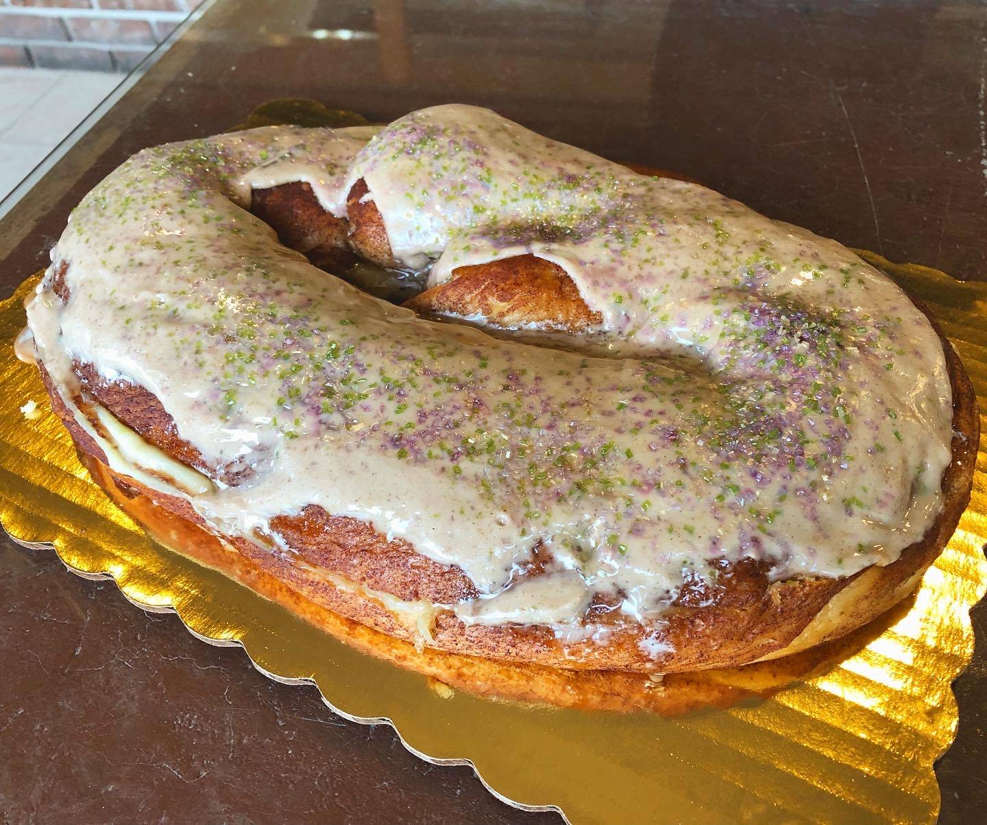 Order Surprise Whole Filled King Cake food online from Breads on Oak Cafe & Bakery store, New Orleans on bringmethat.com