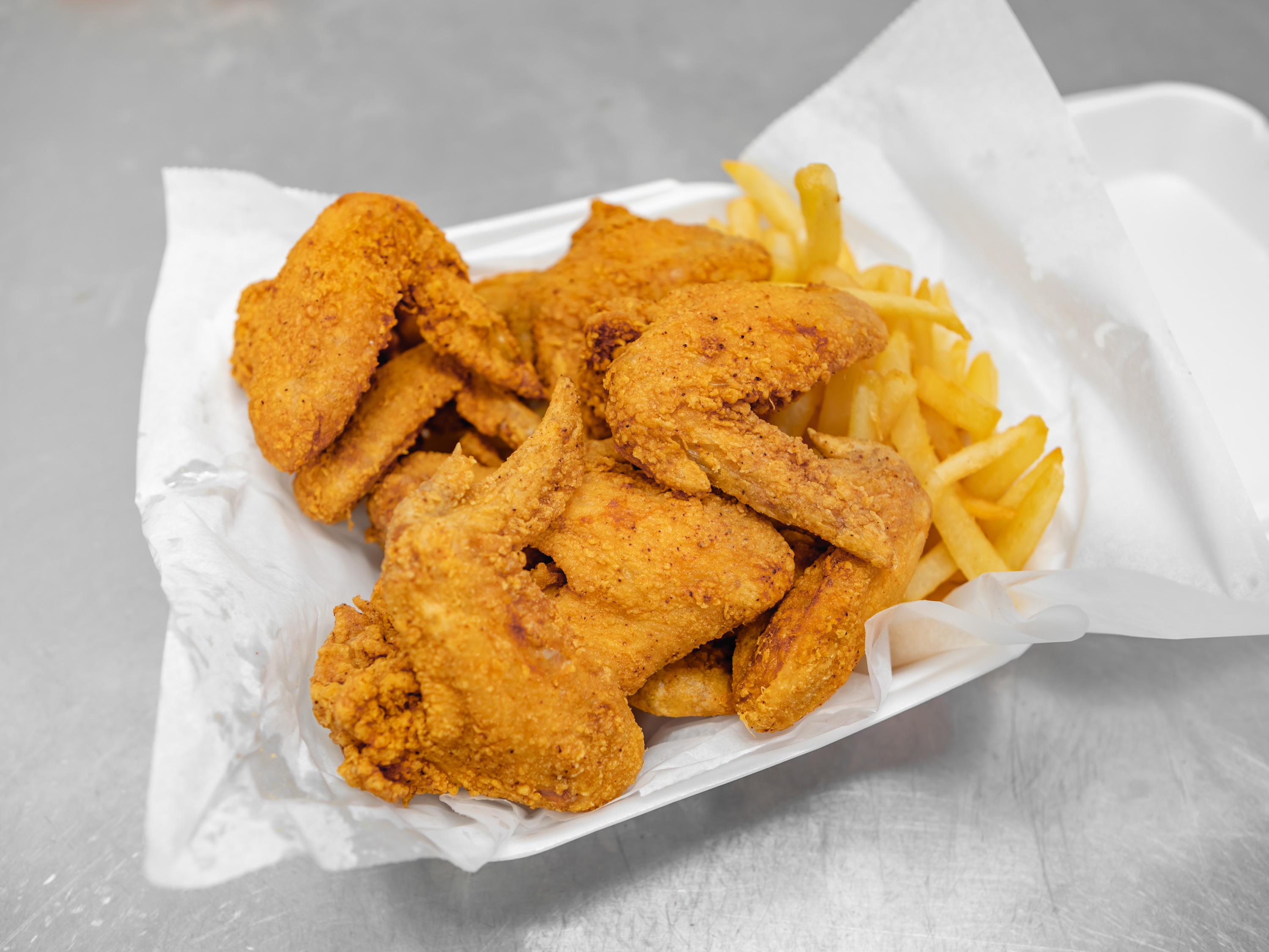 Order Ten Wings Dinner food online from Pops Fish & Chicken Market store, Fairview Heights on bringmethat.com