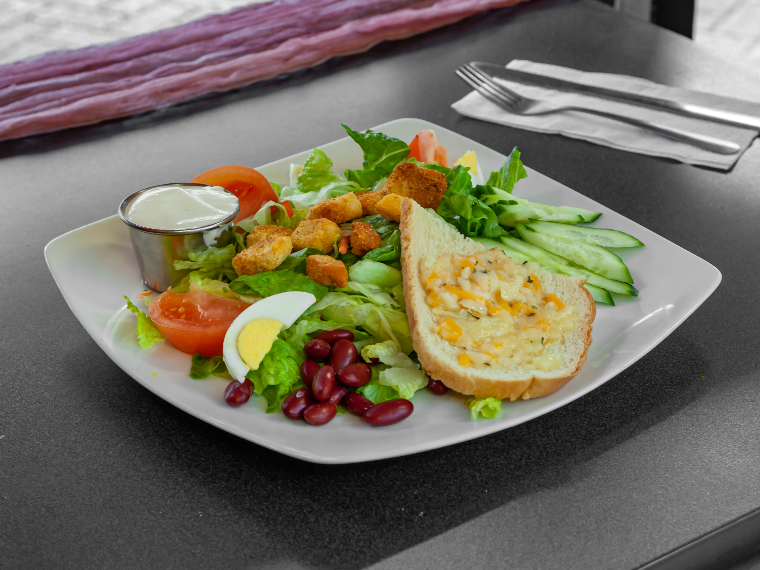 Order Tossed Garden Salad food online from Emil Burger & Breakfast store, Oakland on bringmethat.com