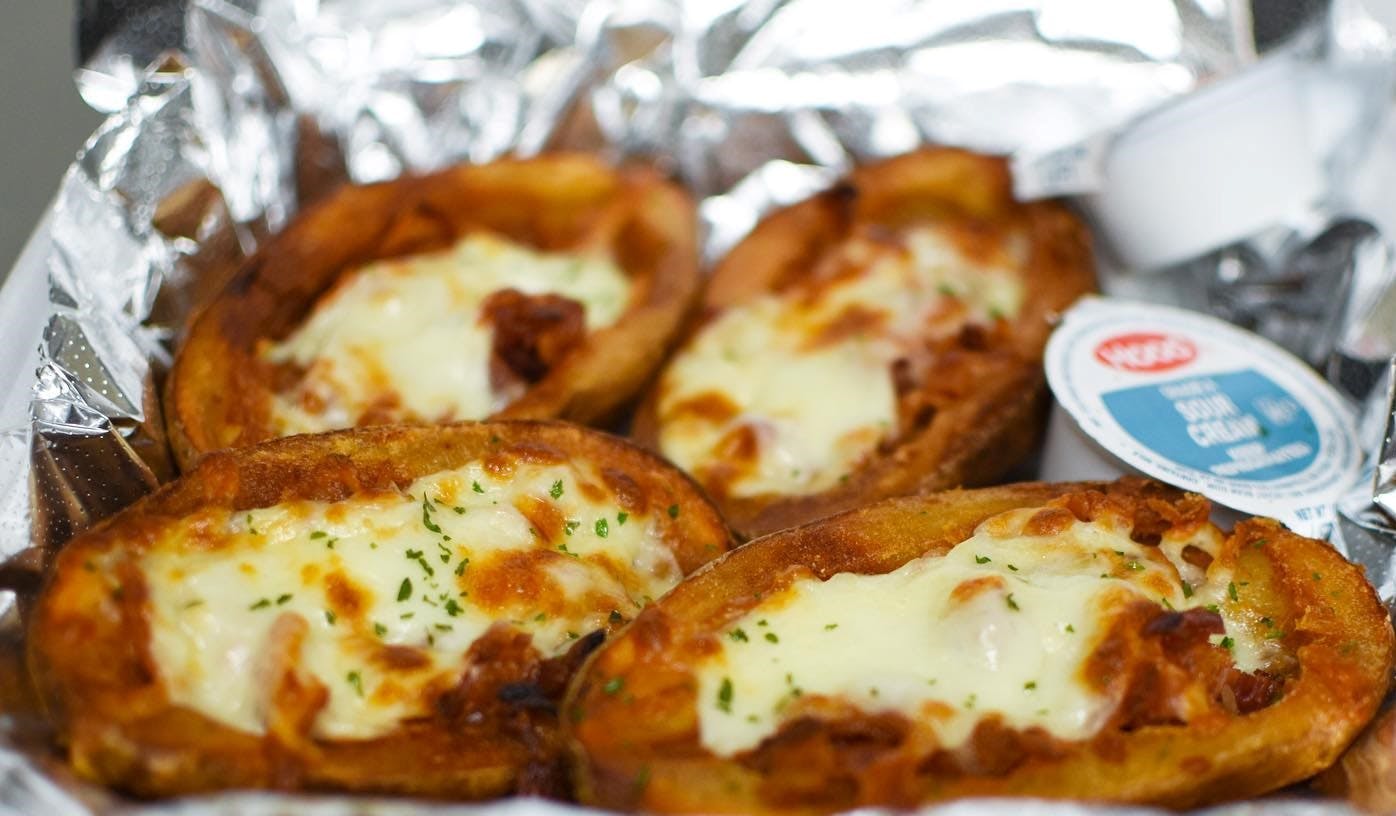 Order Potato Skins - Side food online from Johnny's Pizza store, Brooklyn on bringmethat.com