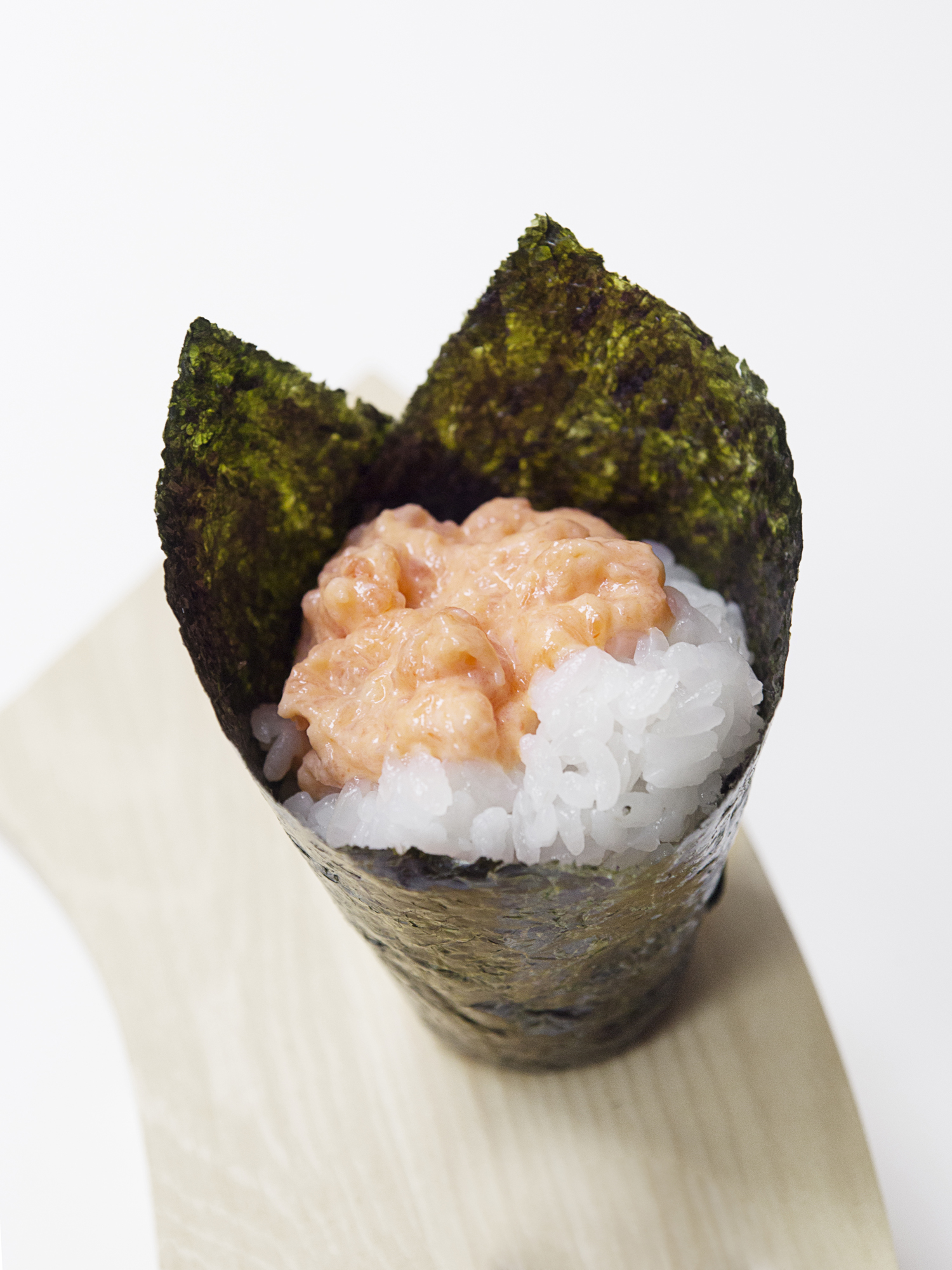 Order Spicy Salmon Handroll food online from Aki Sushi store, New York on bringmethat.com