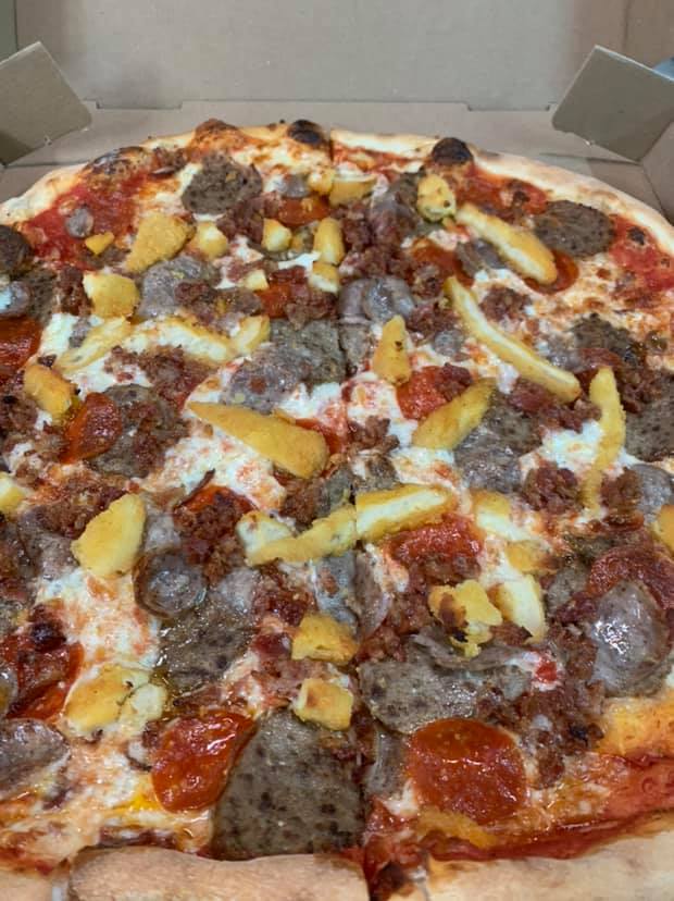 Order Meat Lovers Pizza food online from Pugsley Pizza store, Bronx on bringmethat.com