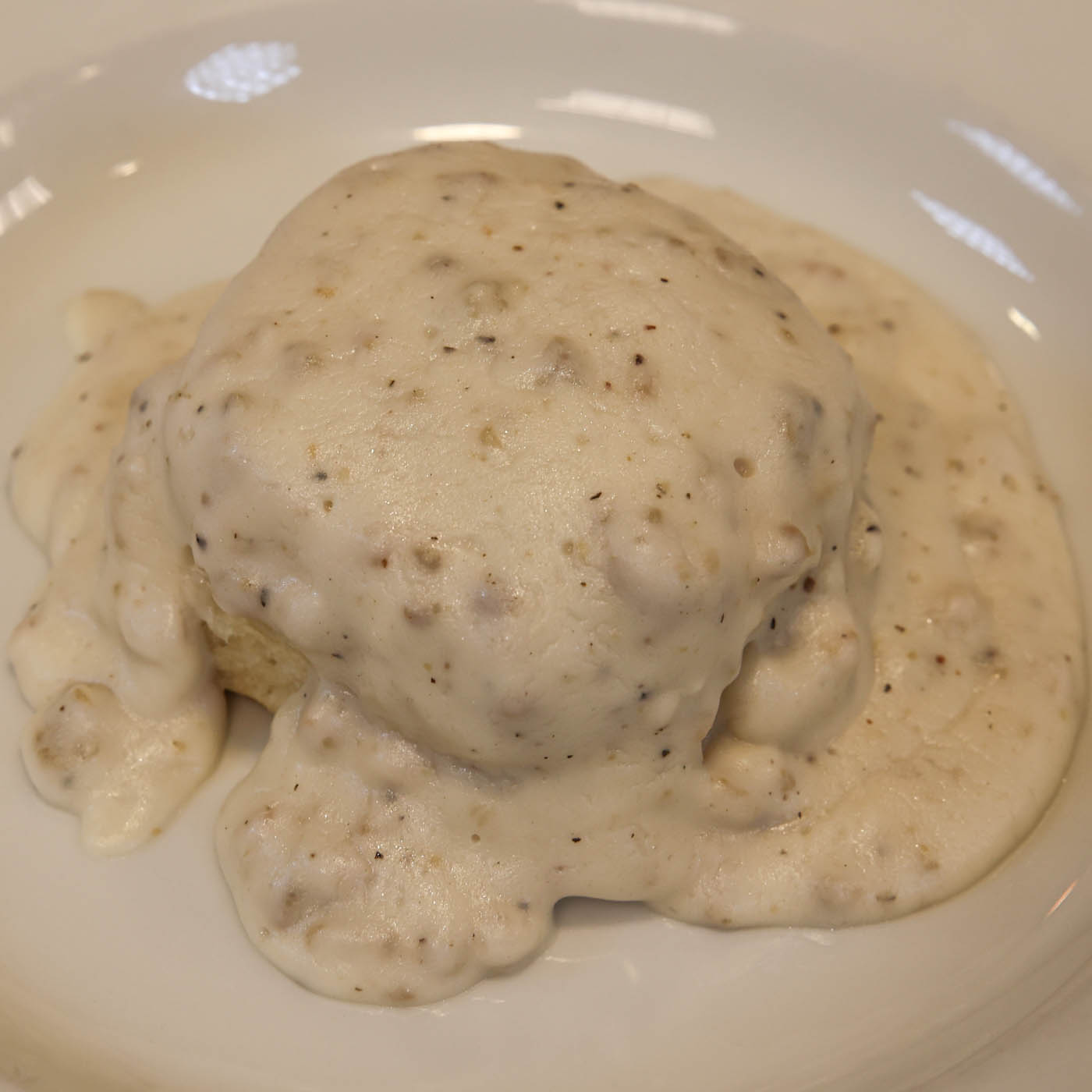 Order Biscuit and Gravy food online from Sunny Street Cafe store, Painesville on bringmethat.com