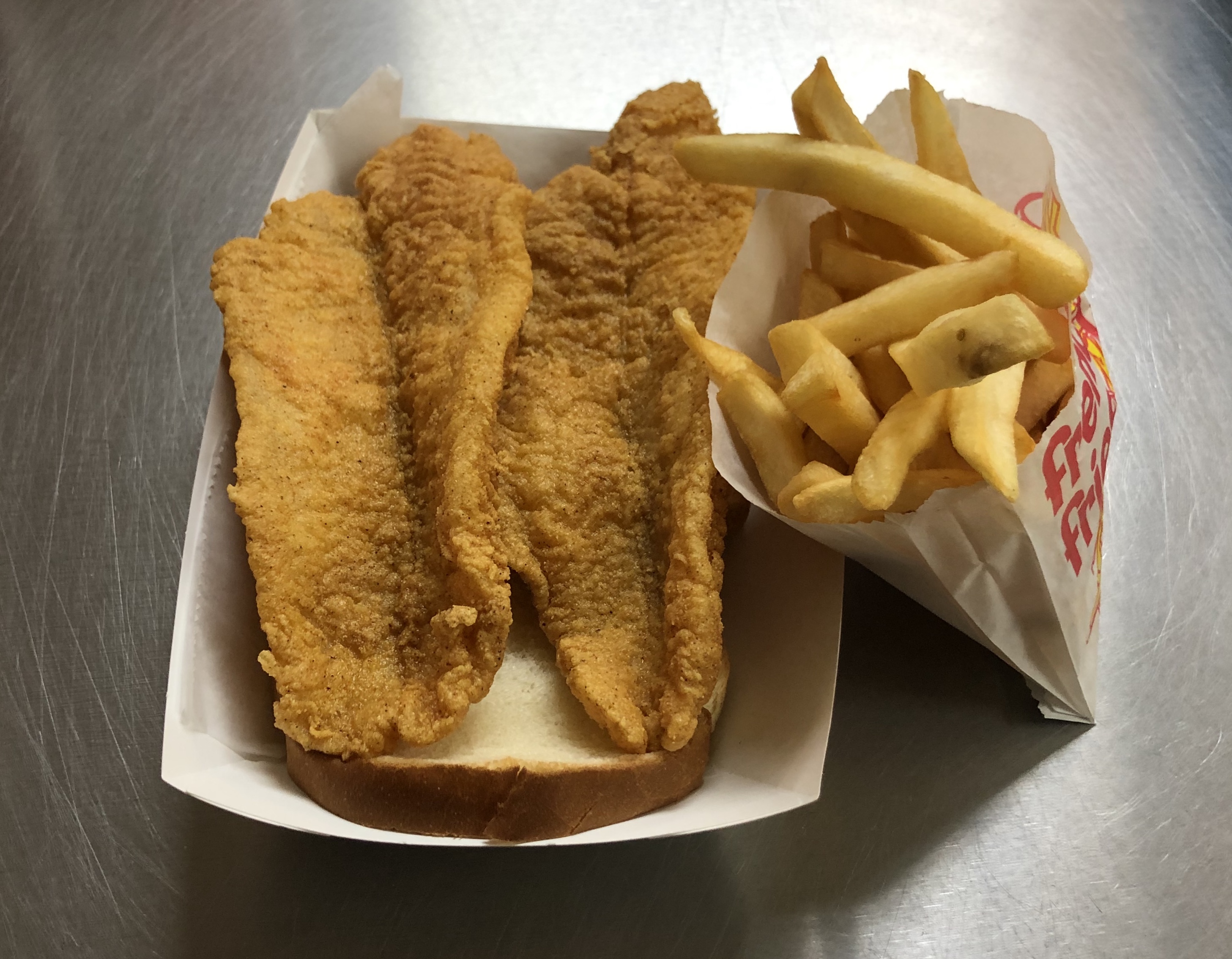 Order 2-Piece Catfish Dinner food online from Harold's Chicken store, Chicago on bringmethat.com