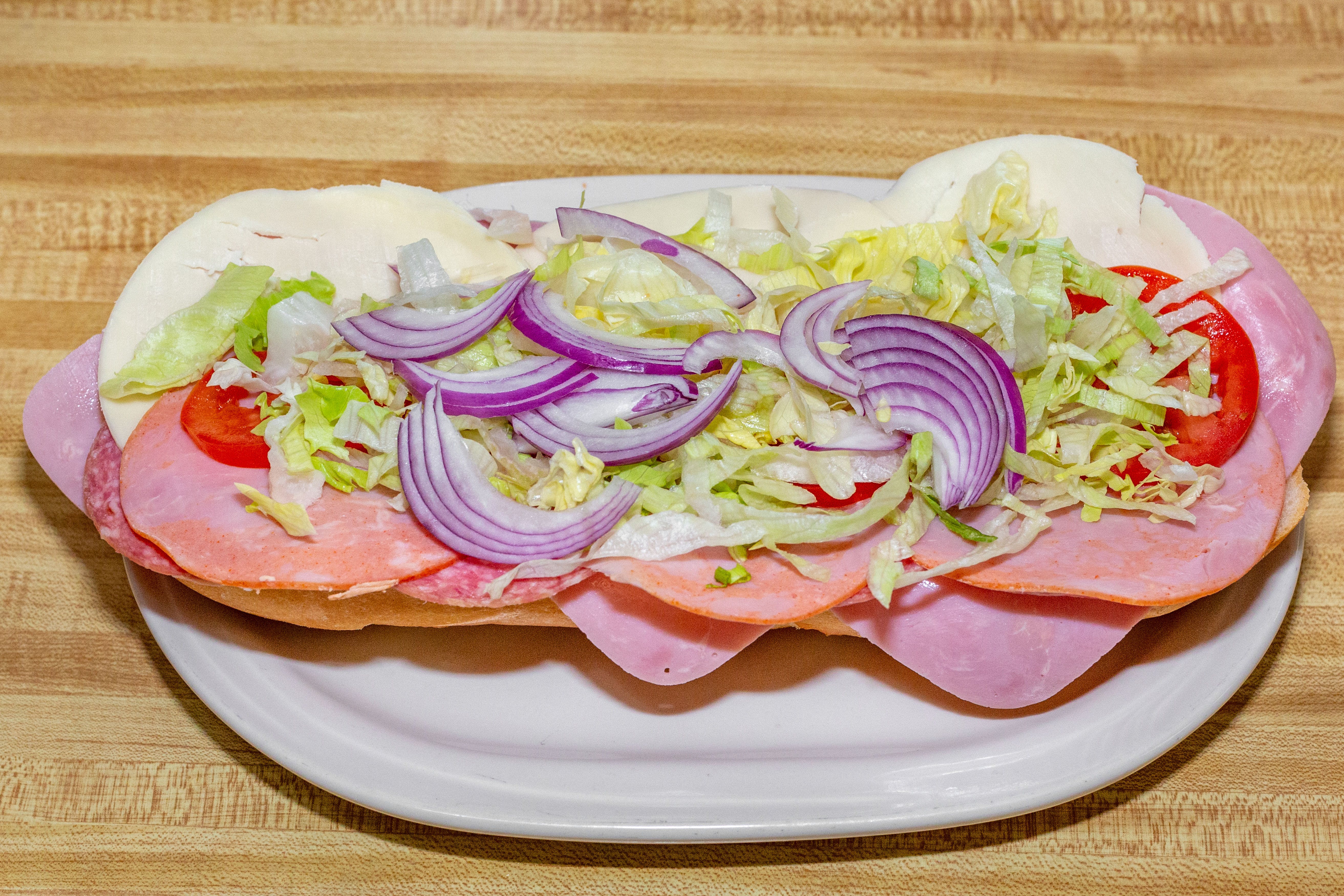 Order Italian Hoagie Sandwich - Sandwich food online from Capri Pizza store, Sicklerville on bringmethat.com