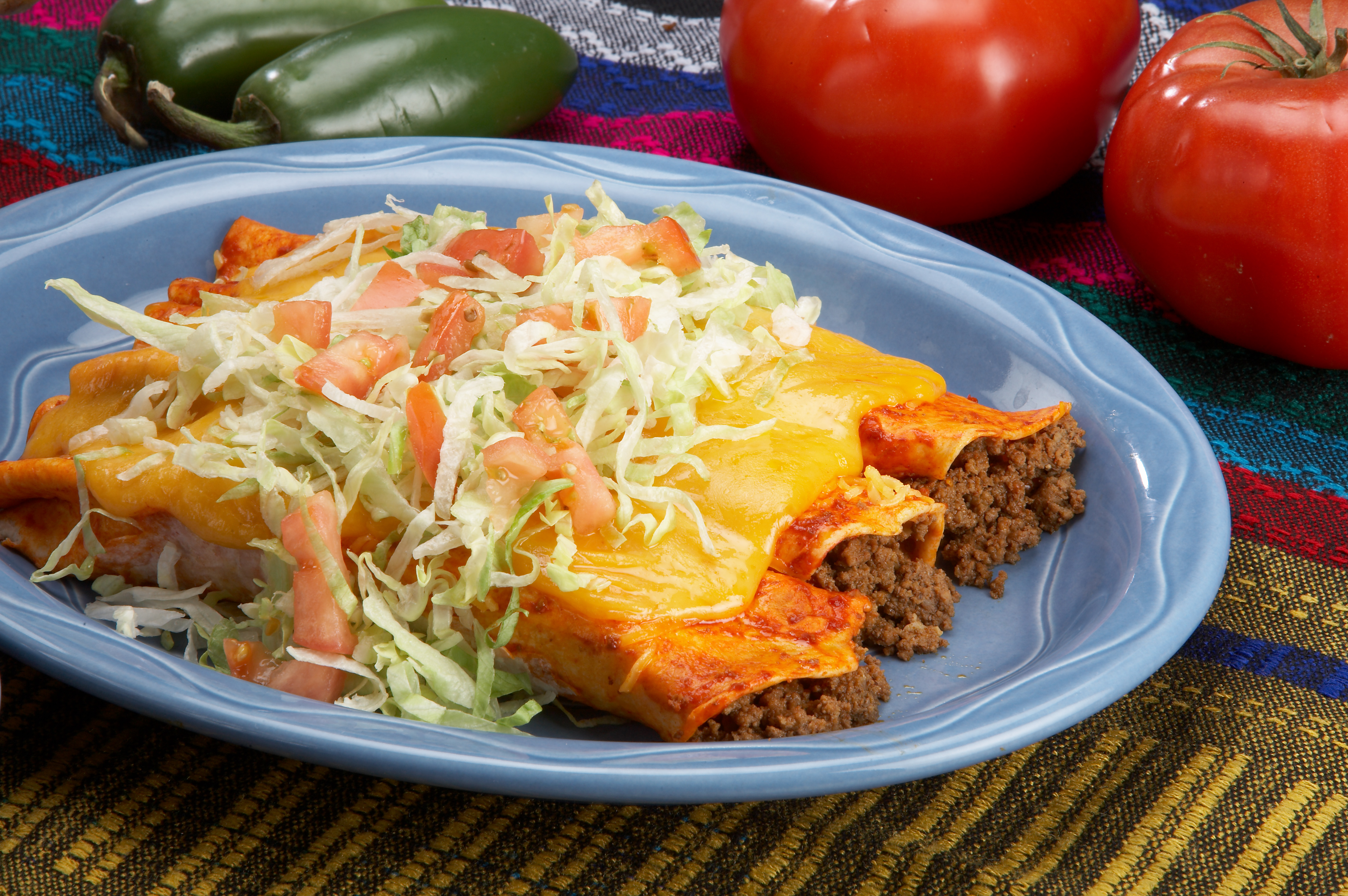 Order Order of 3 Enchiladas food online from Rudy's Tacos - 11th St. store, Davenport on bringmethat.com