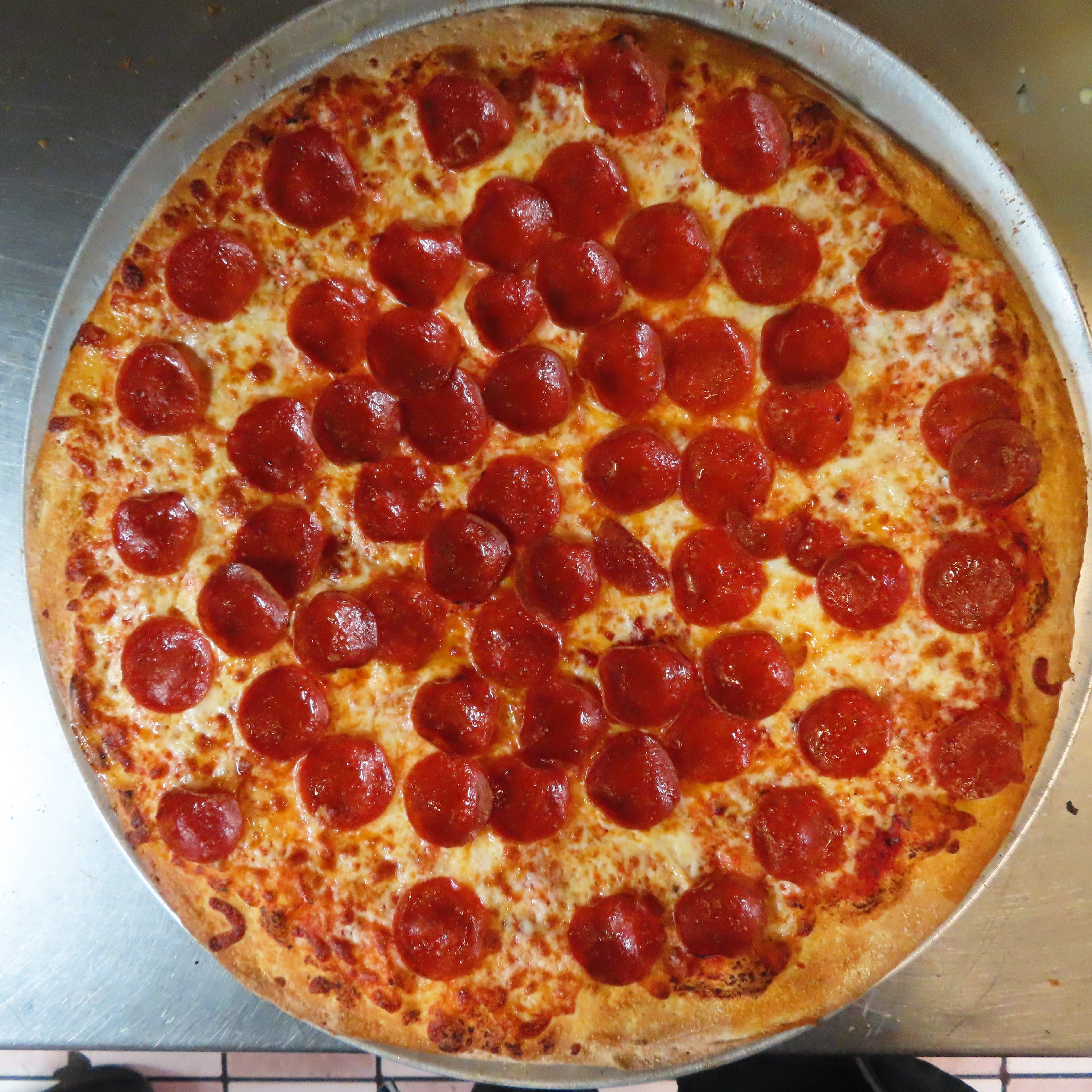 Order Classic Pepperoni Pizza - Medium 12" food online from The Pizza Guy store, Dallas on bringmethat.com