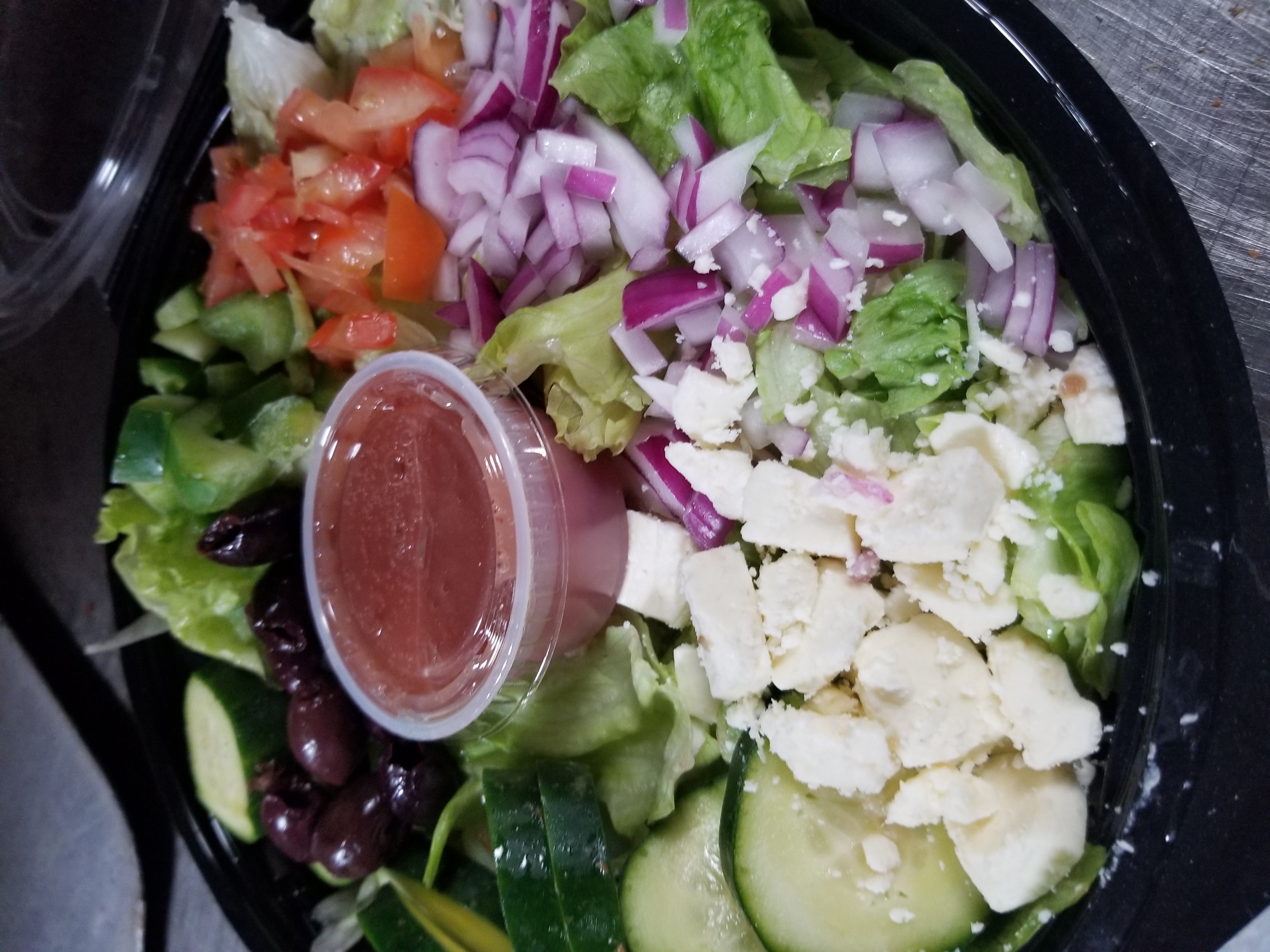 Order Greek Salad food online from Midnite Slice store, Seabrook on bringmethat.com