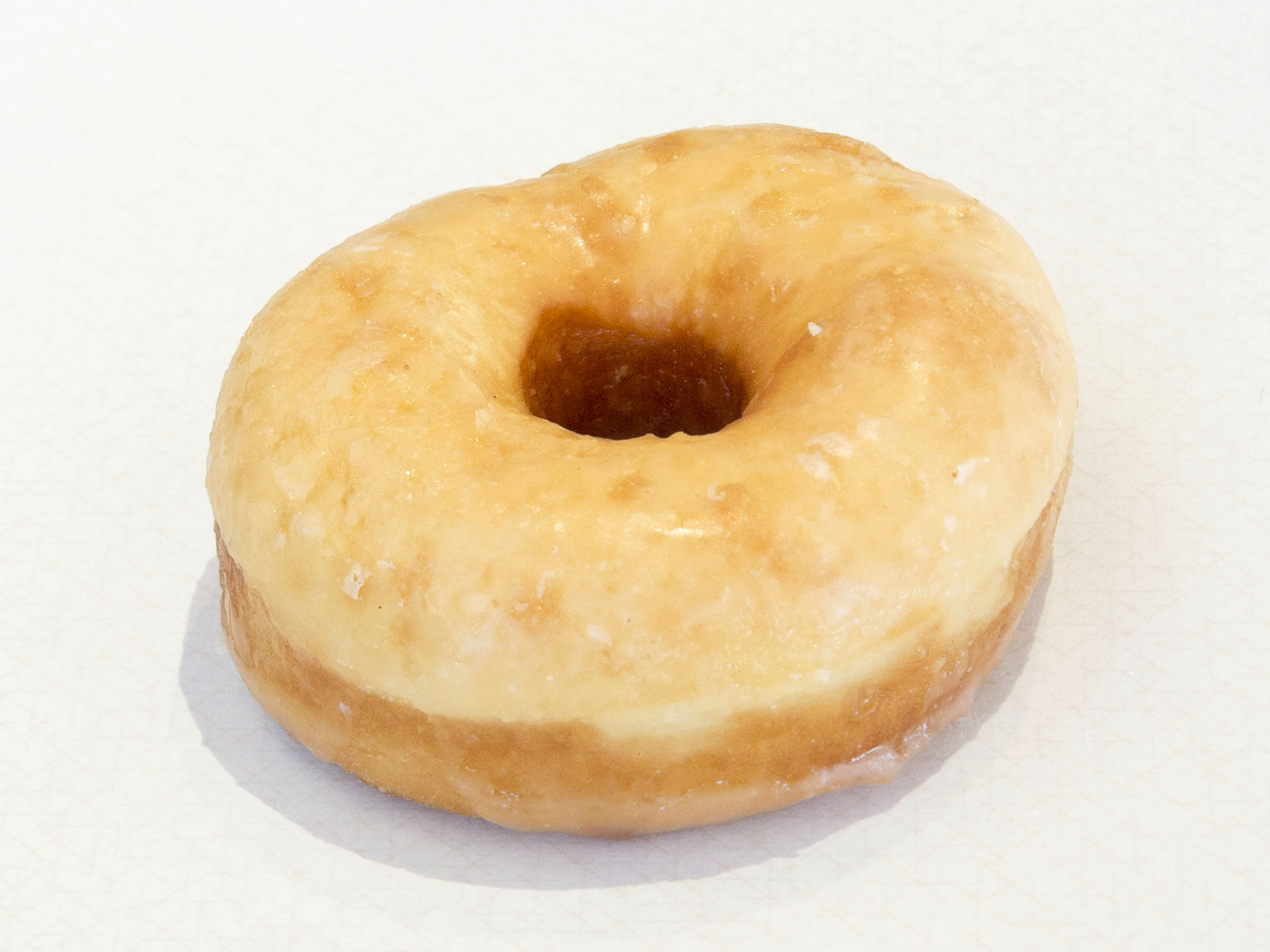 Order Glazed Yeast Raised Donut food online from Hypnotic Donuts store, Dallas on bringmethat.com