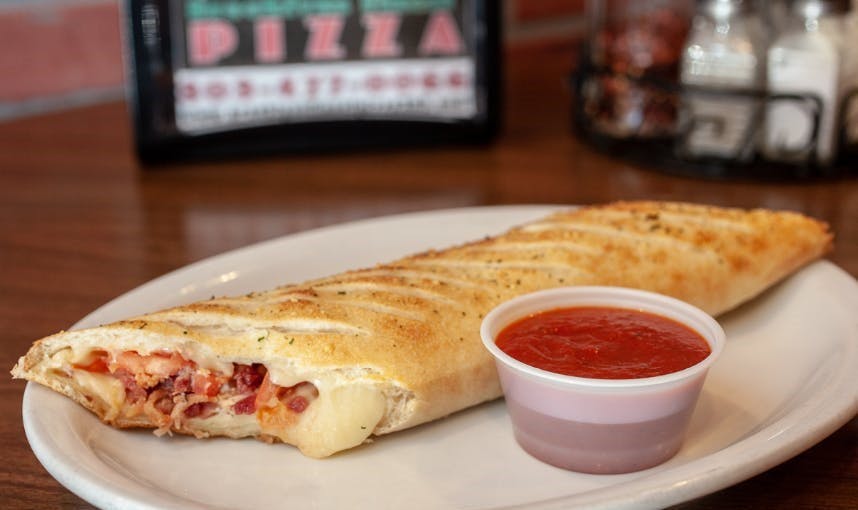 Order Classic Meat Stromboli - Stromboli food online from Brooklyns Finest Pizza store, Denver on bringmethat.com