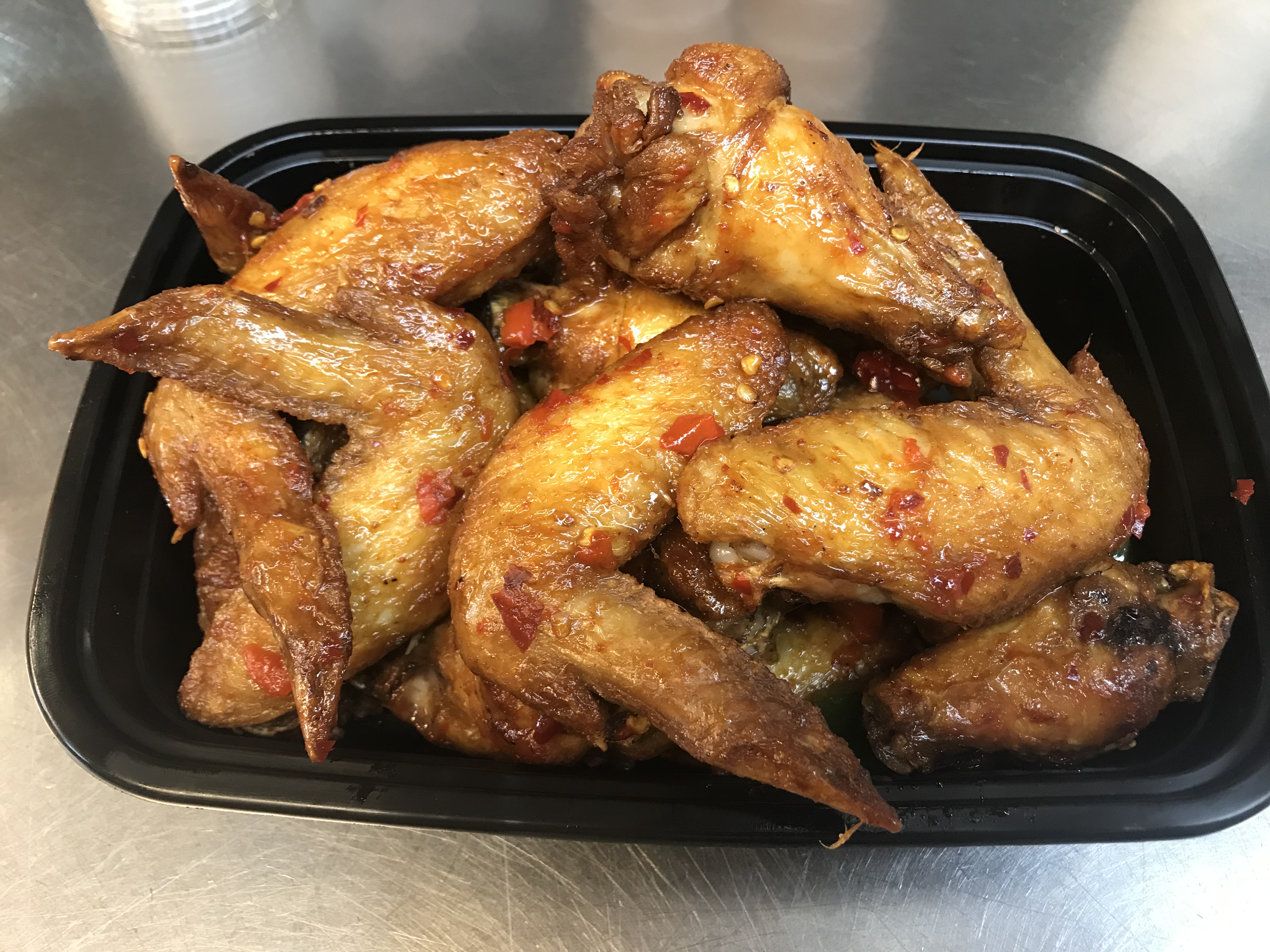 Order Spicy Salt and Pepper Chicken Wings food online from Canton Eatery store, Boston on bringmethat.com
