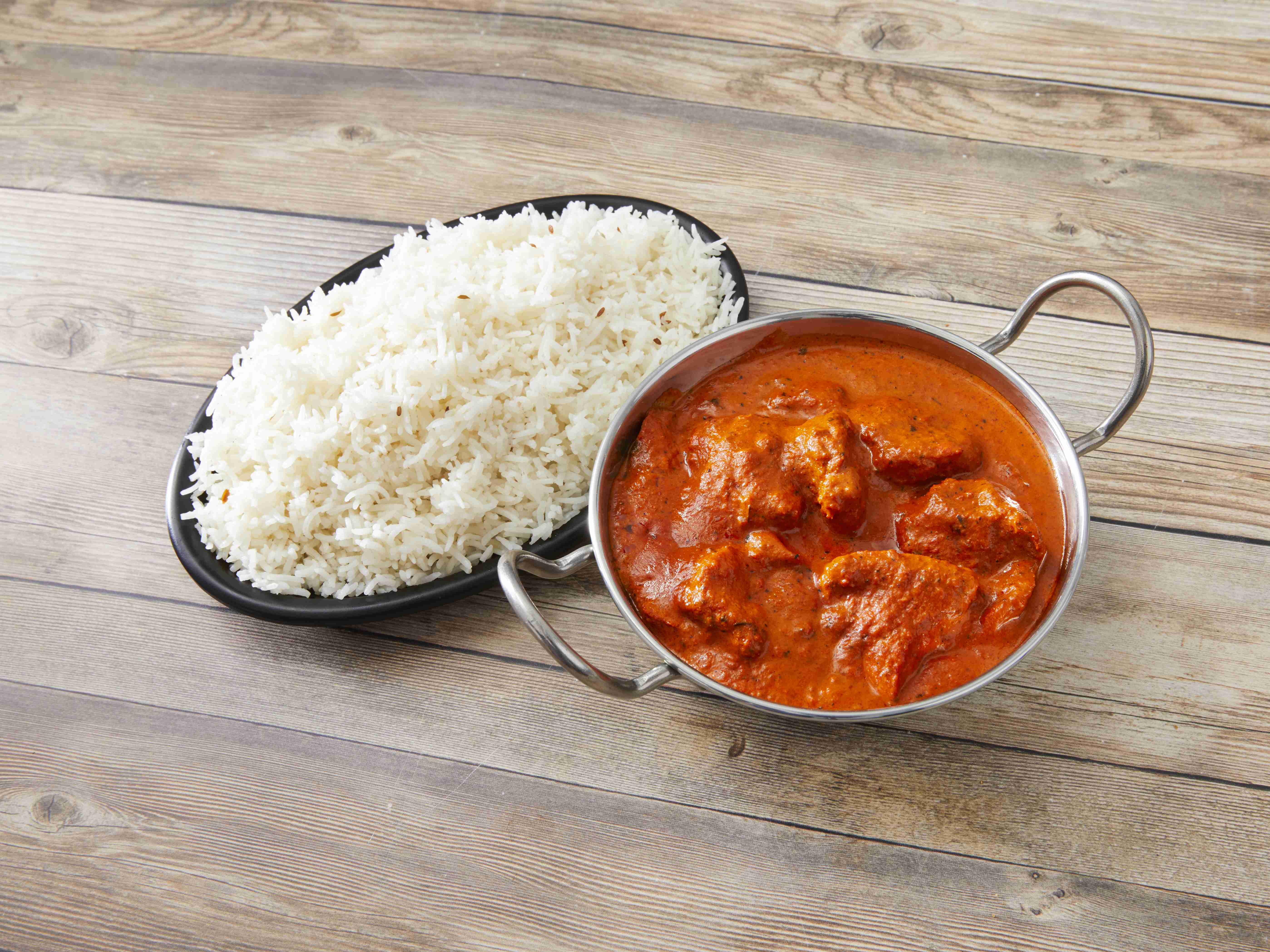 Order Chicken Makhani food online from Grill of India store, Flint on bringmethat.com