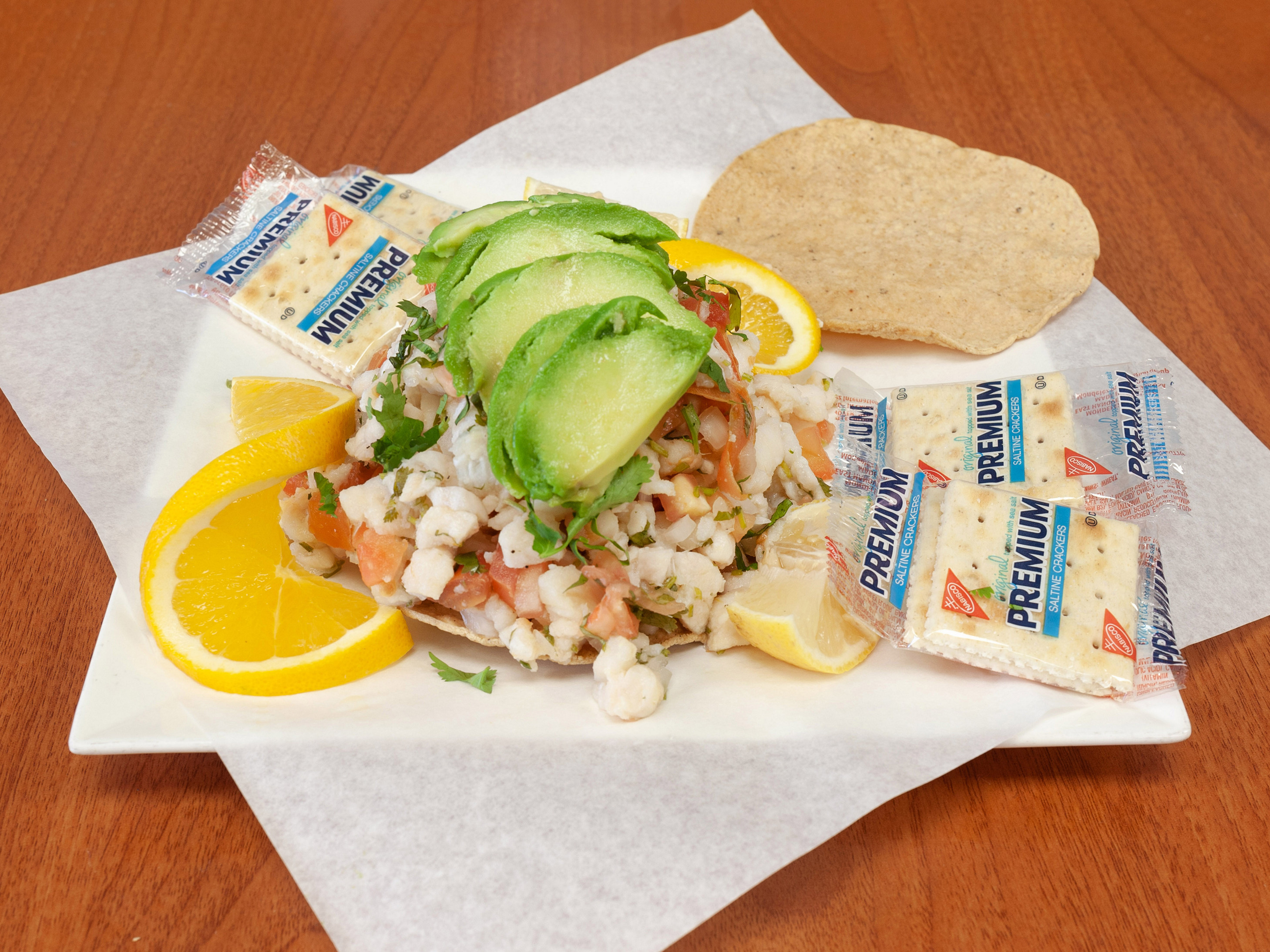 Order Ceviche Tostada food online from Jungle Juice store, Oxnard on bringmethat.com